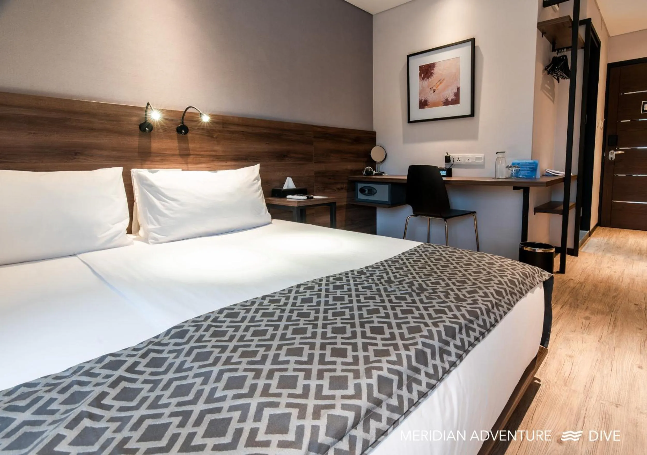 Bed in Meridian Adventure Marina Club & Resort