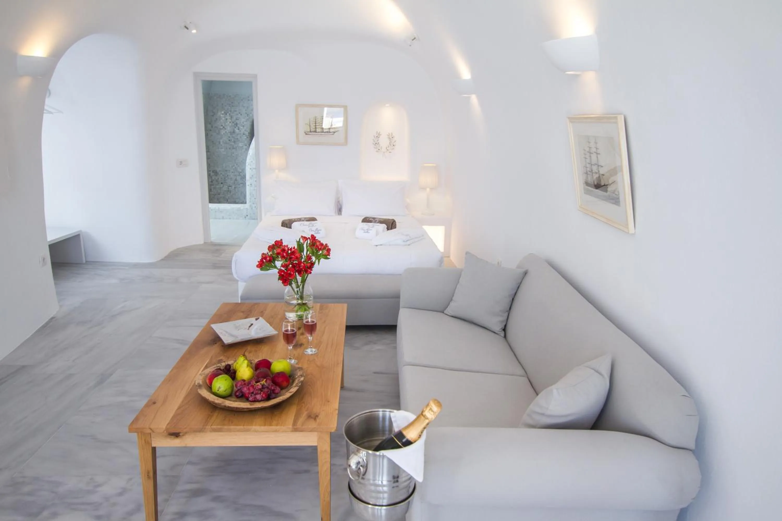 Seating area, Bed in Oia Mare Villas