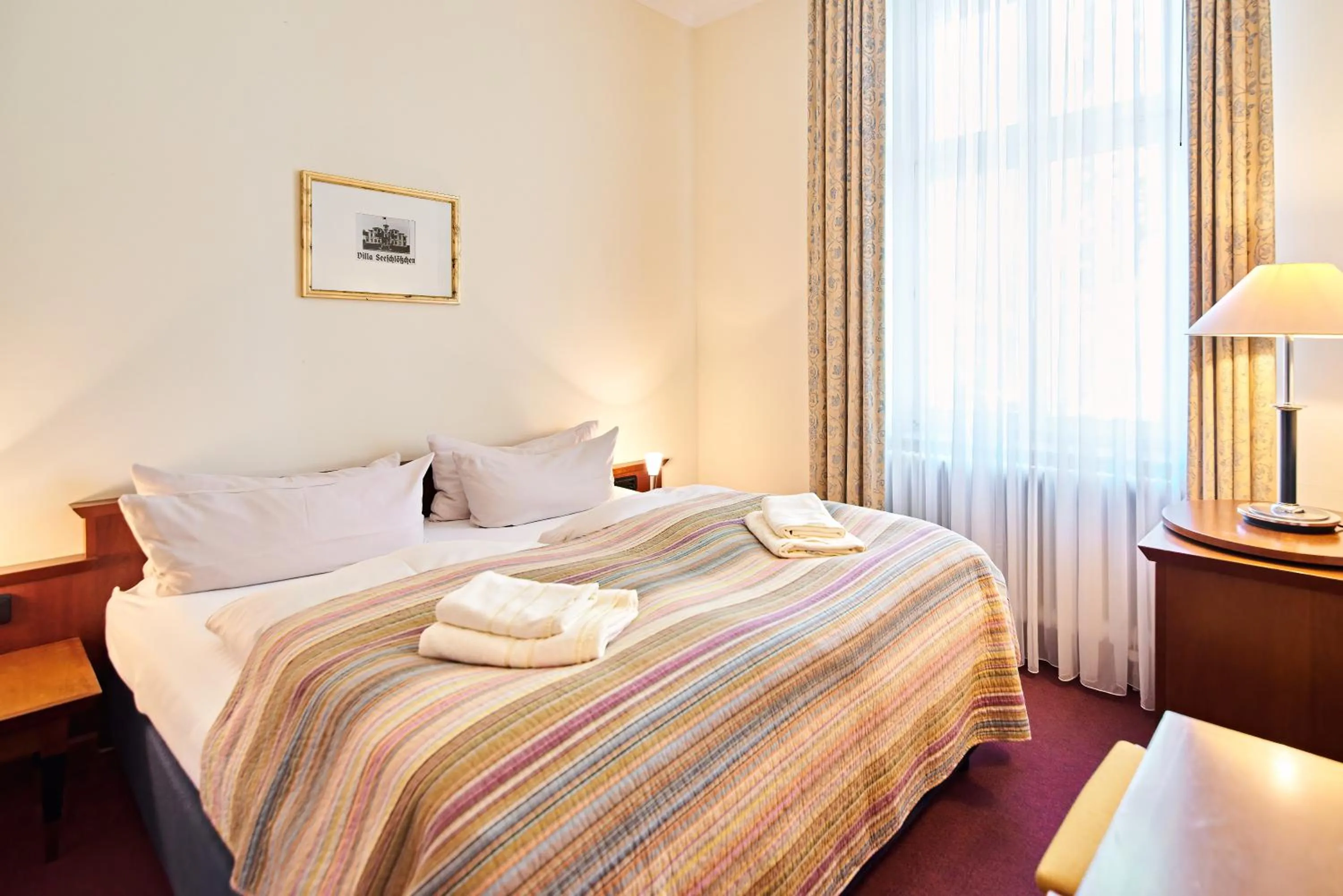 Bed in Aparthotel Seeschlösschen