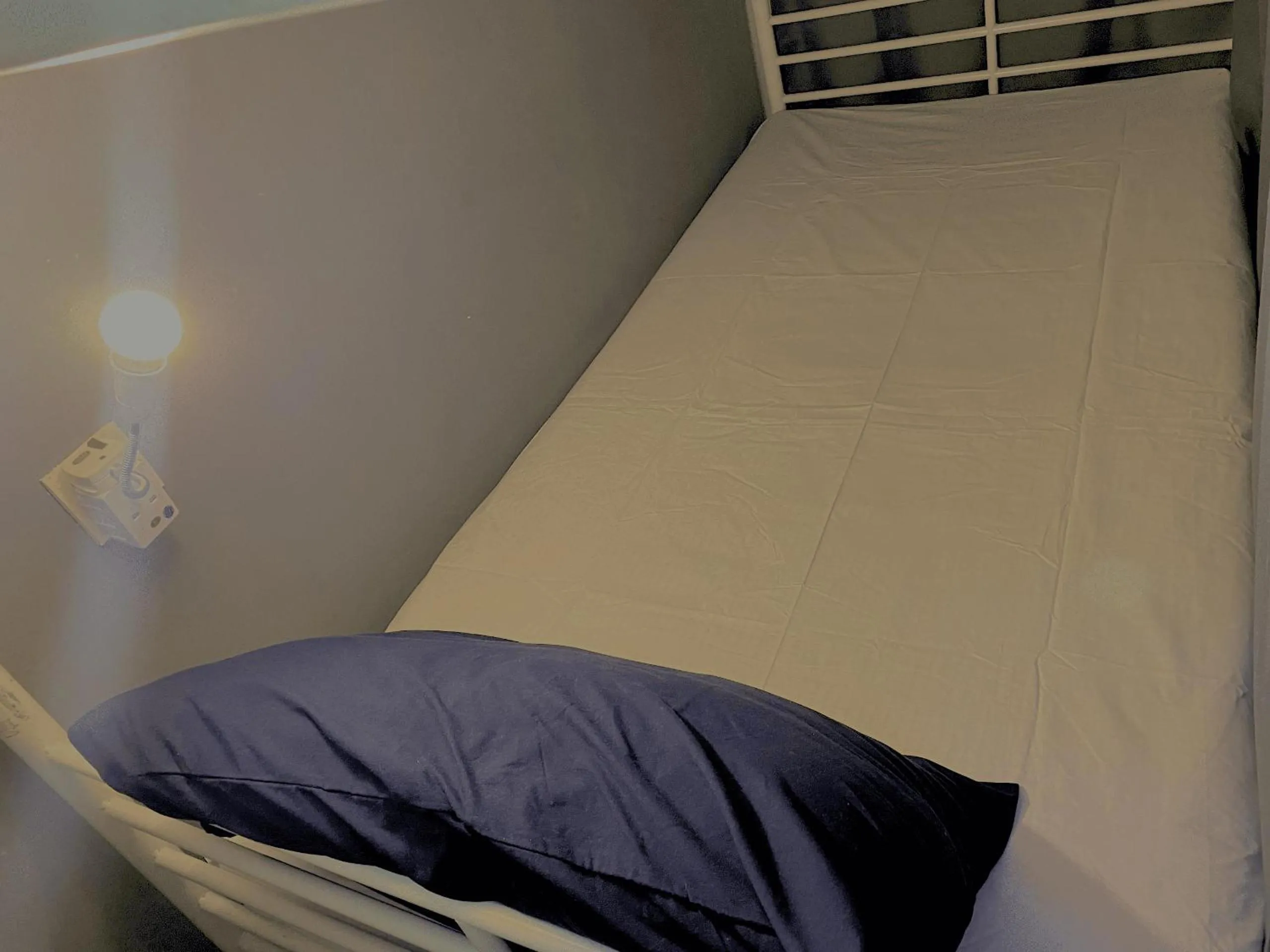 Bed in Travelogue Guest House