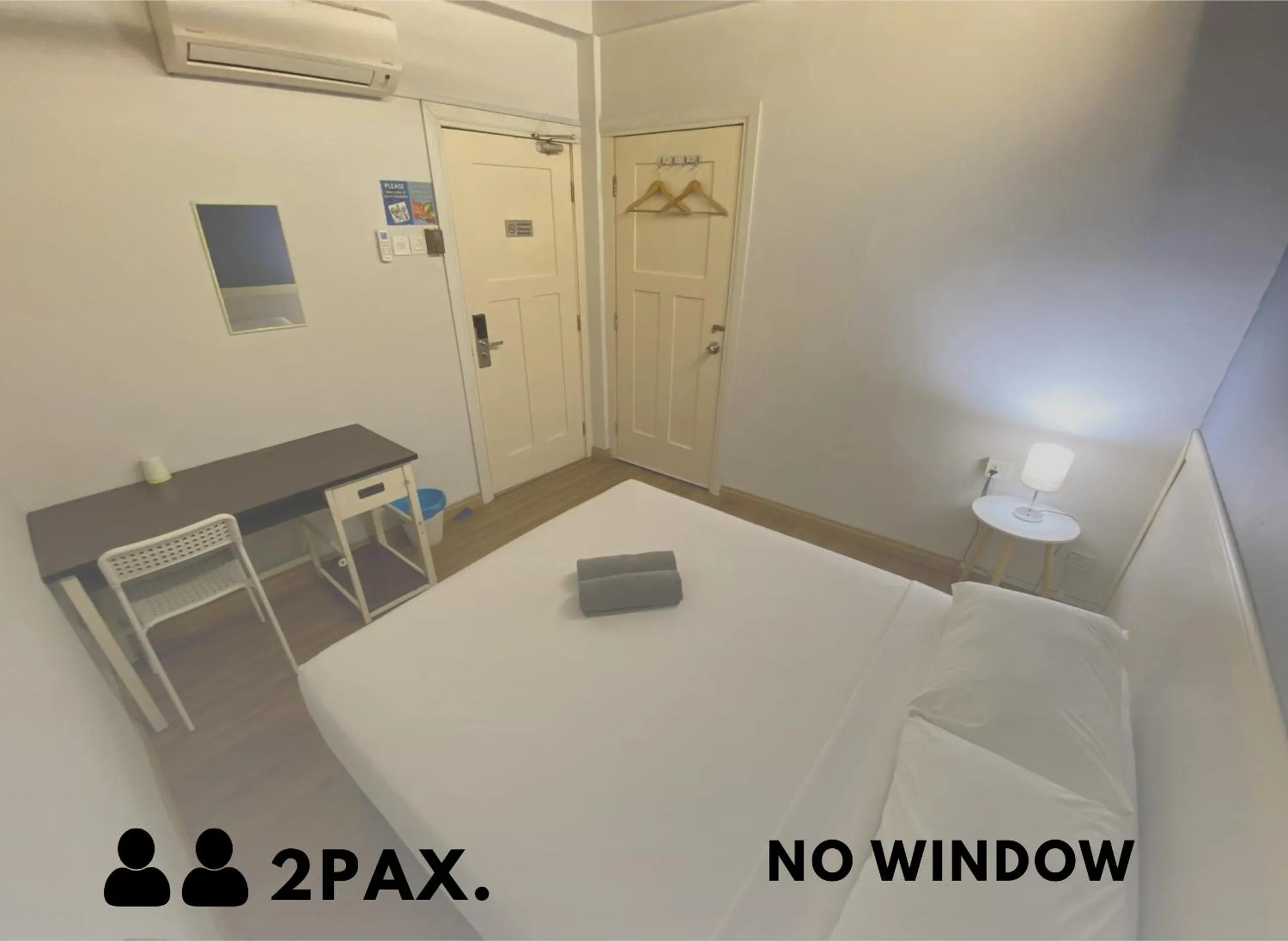 Bed in Travelogue Guest House