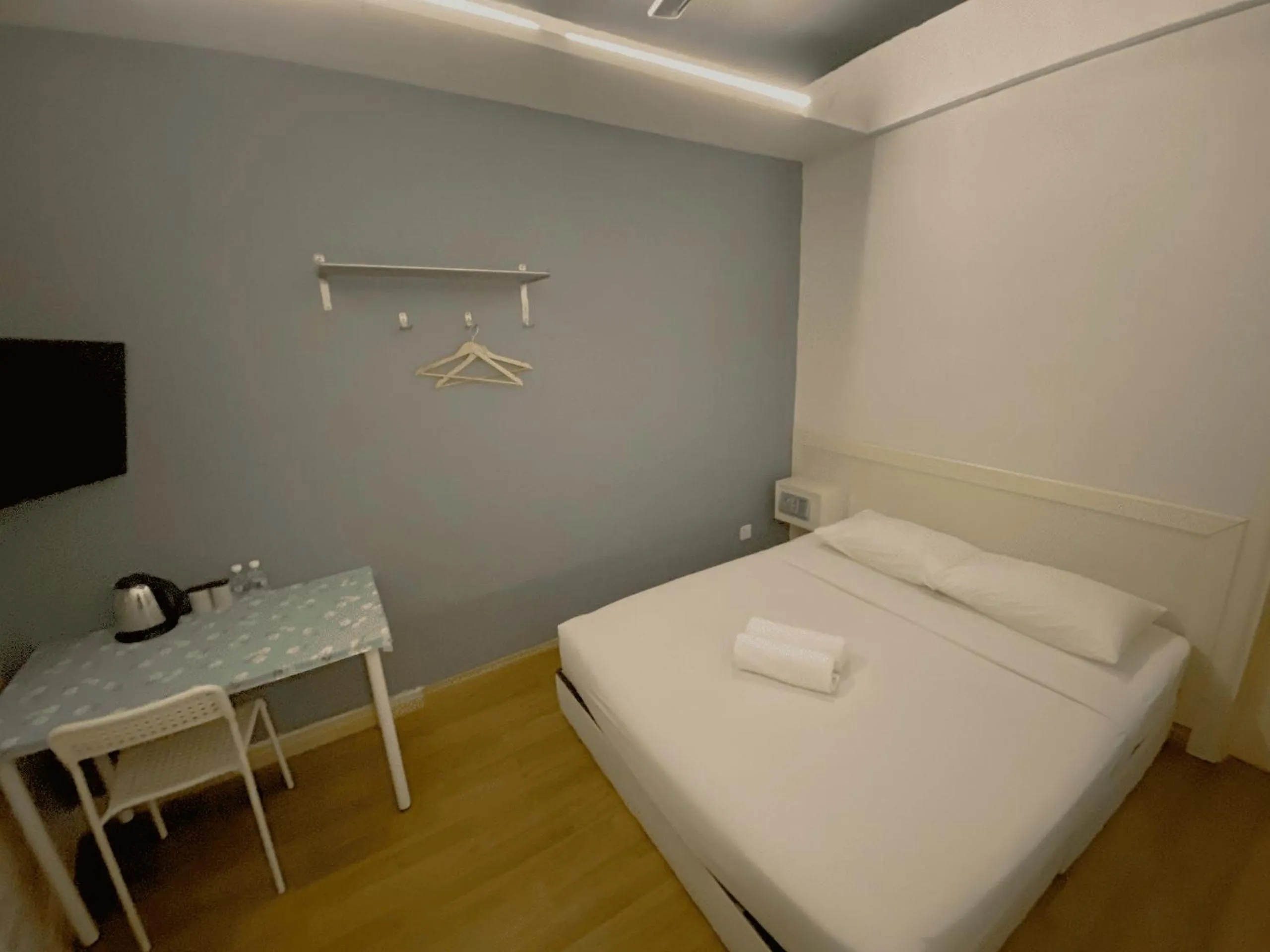 Bed in Travelogue Guest House