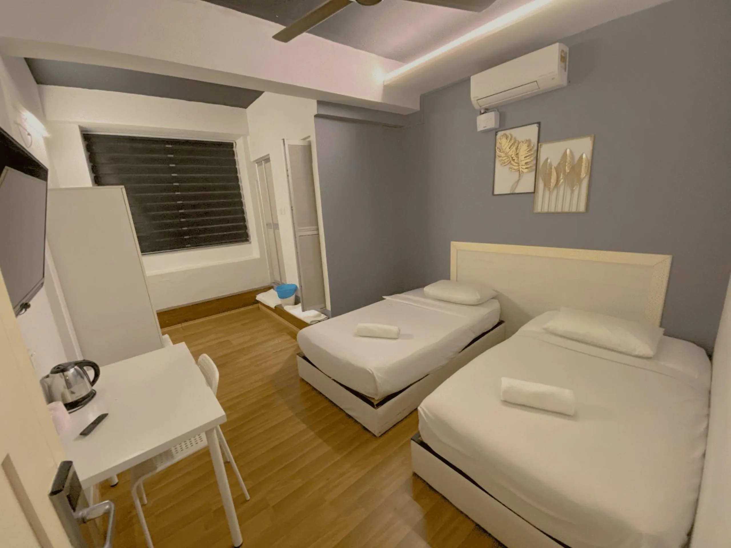 Bed in Travelogue Guest House