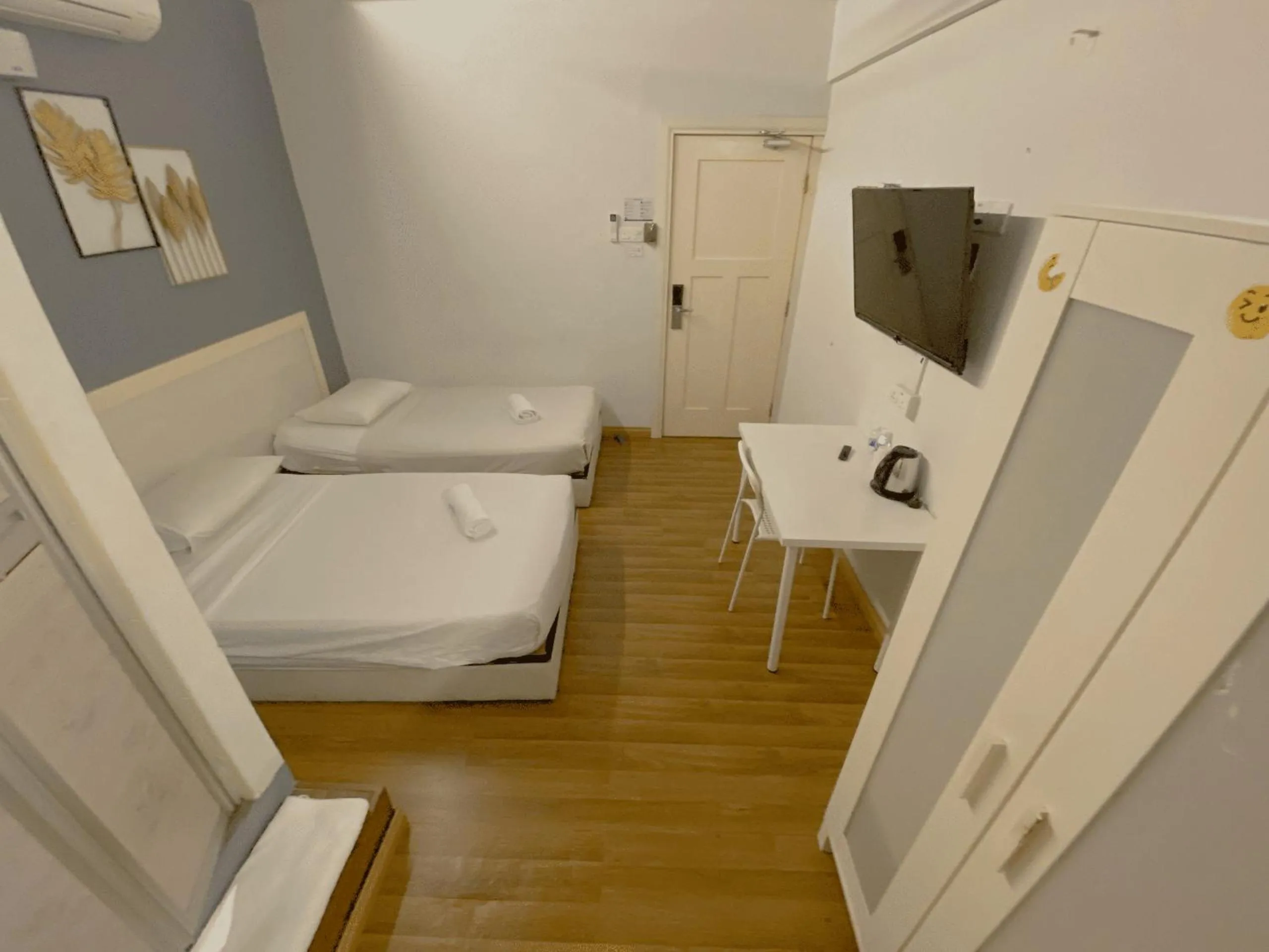 Bed in Travelogue Guest House