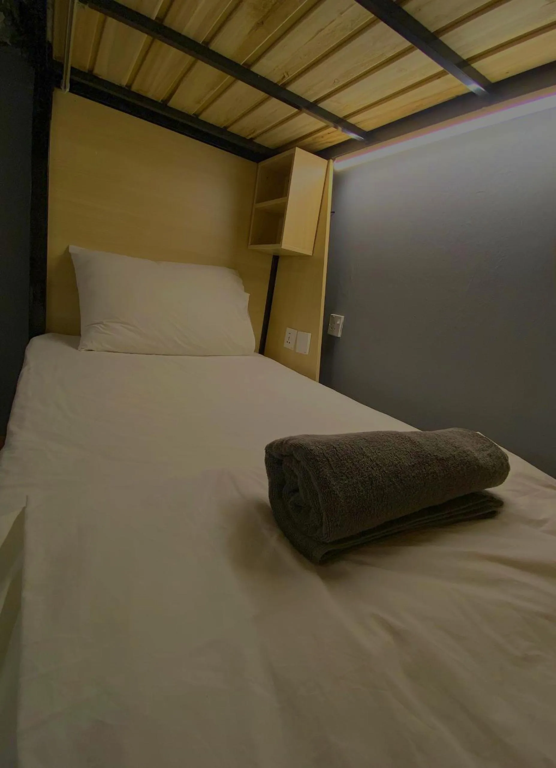 Bed in Travelogue Guest House