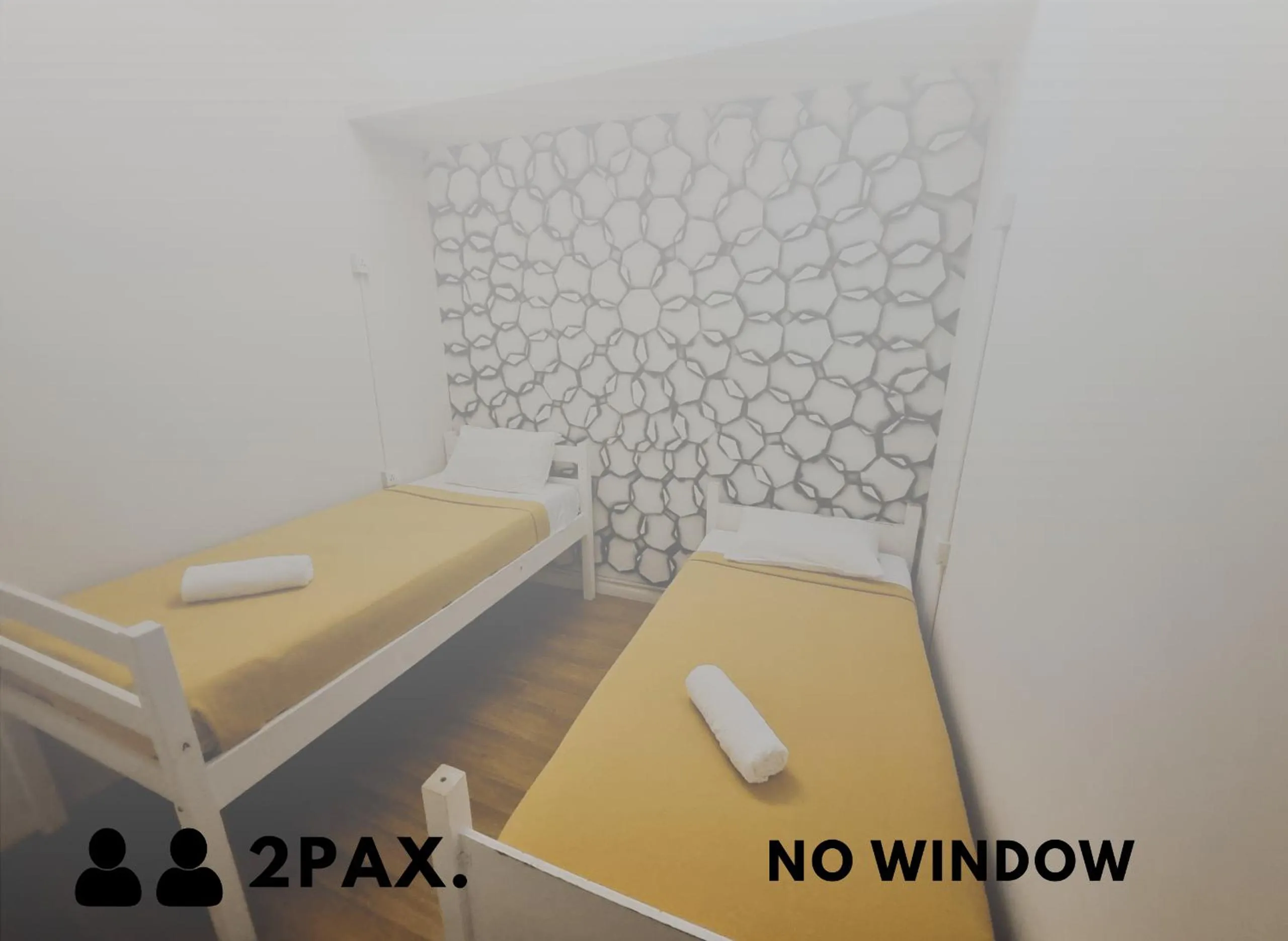 Bed in Travelogue Guest House