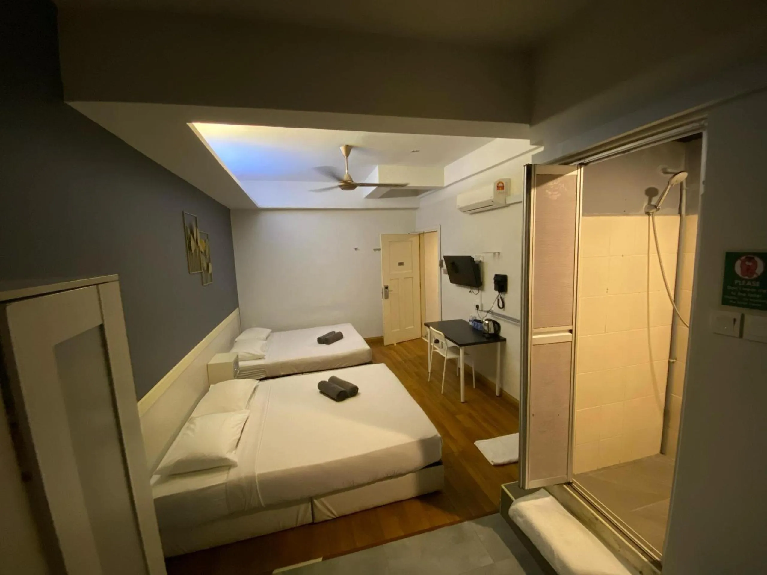 Bed in Travelogue Guest House