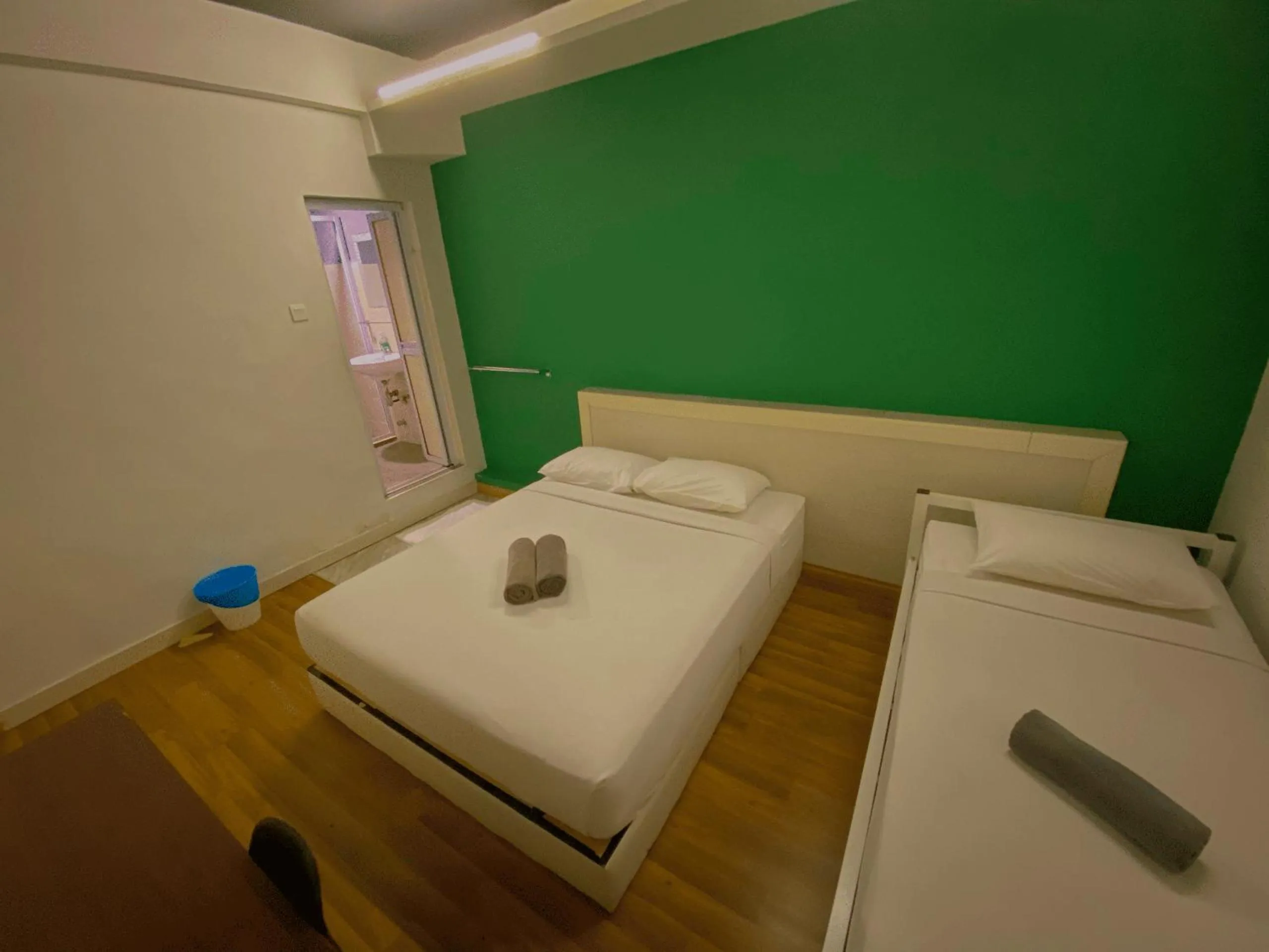 Bed in Travelogue Guest House