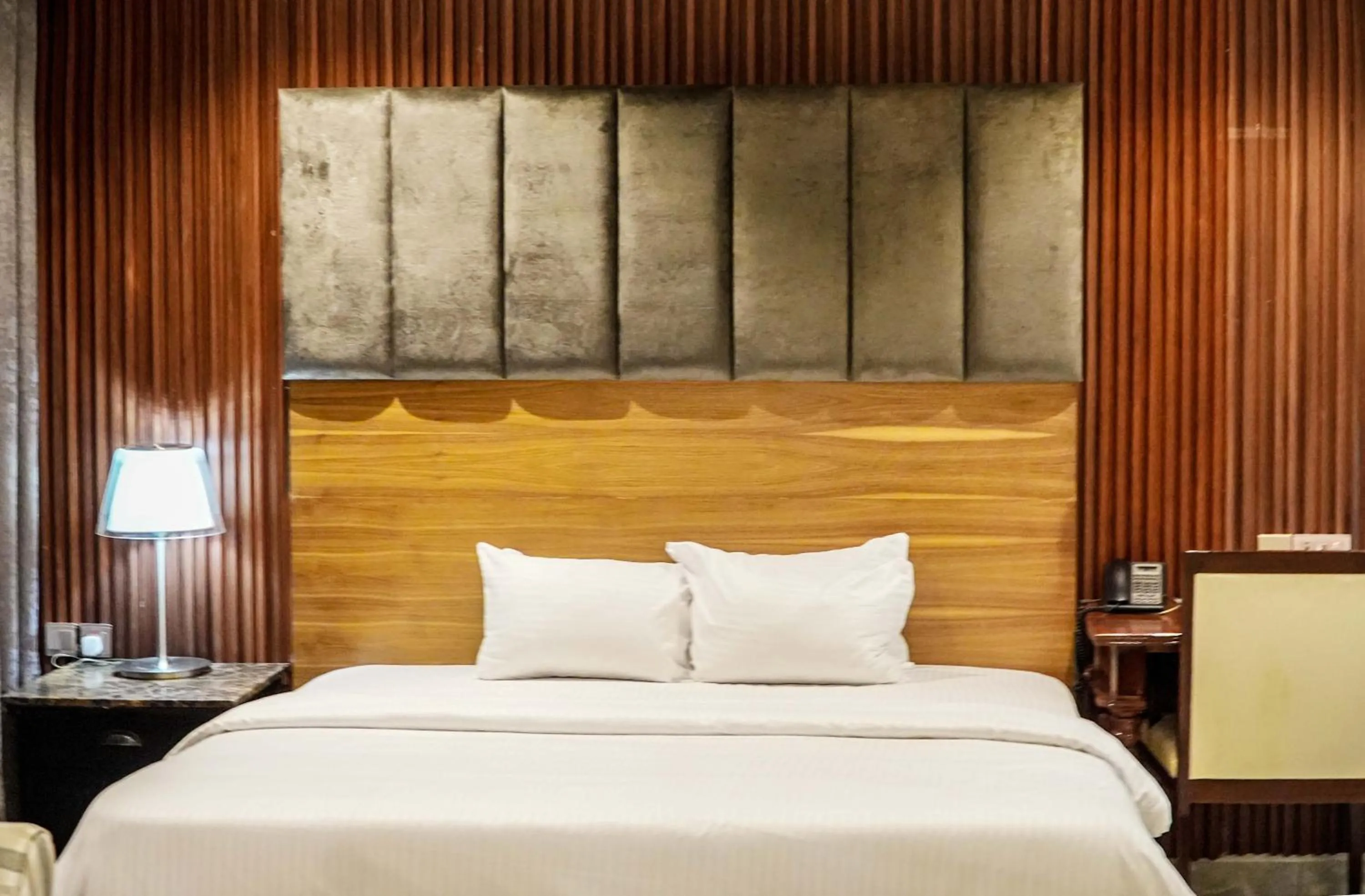 View (from property/room), Bed in Amor Hotels Abuja