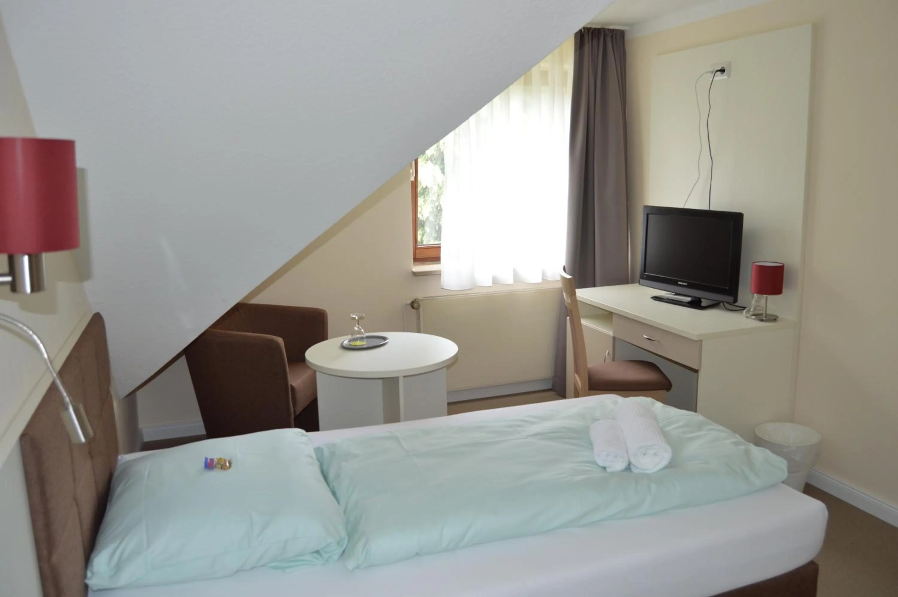 Photo of the whole room, Bed in G&H Hotel Rosengarten