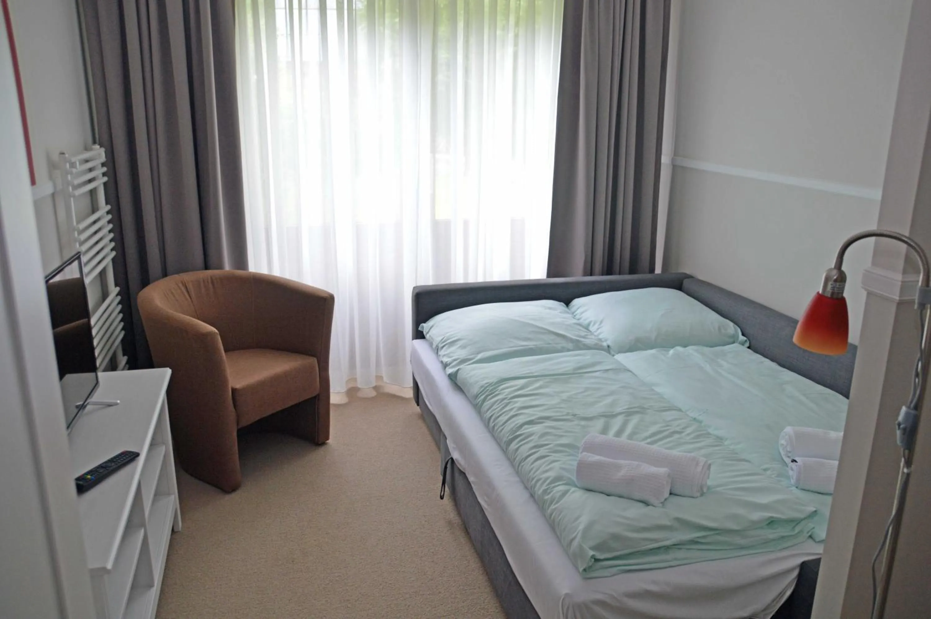 Photo of the whole room, Bed in G&H Hotel Rosengarten