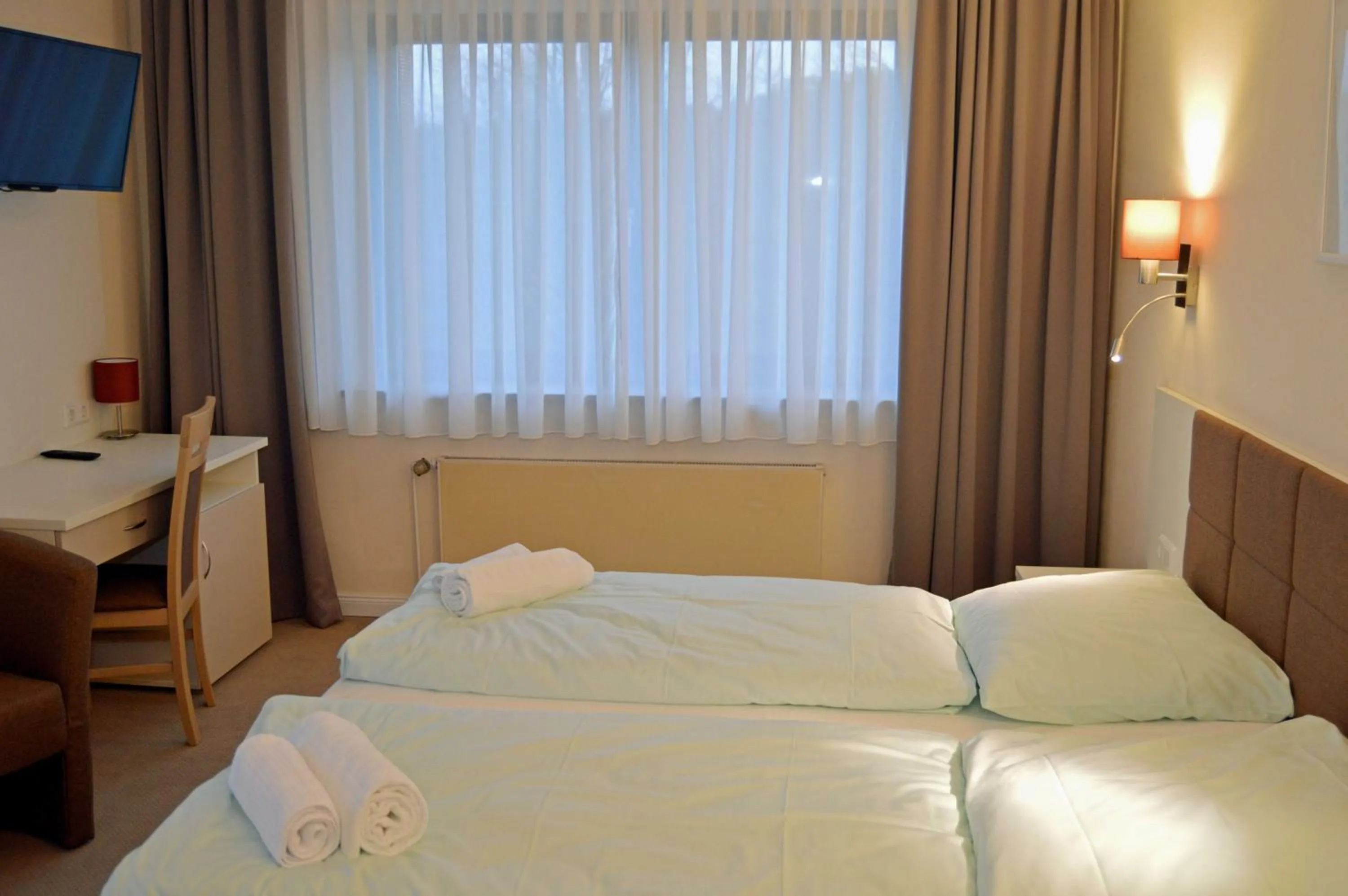 Photo of the whole room, Bed in G&H Hotel Rosengarten