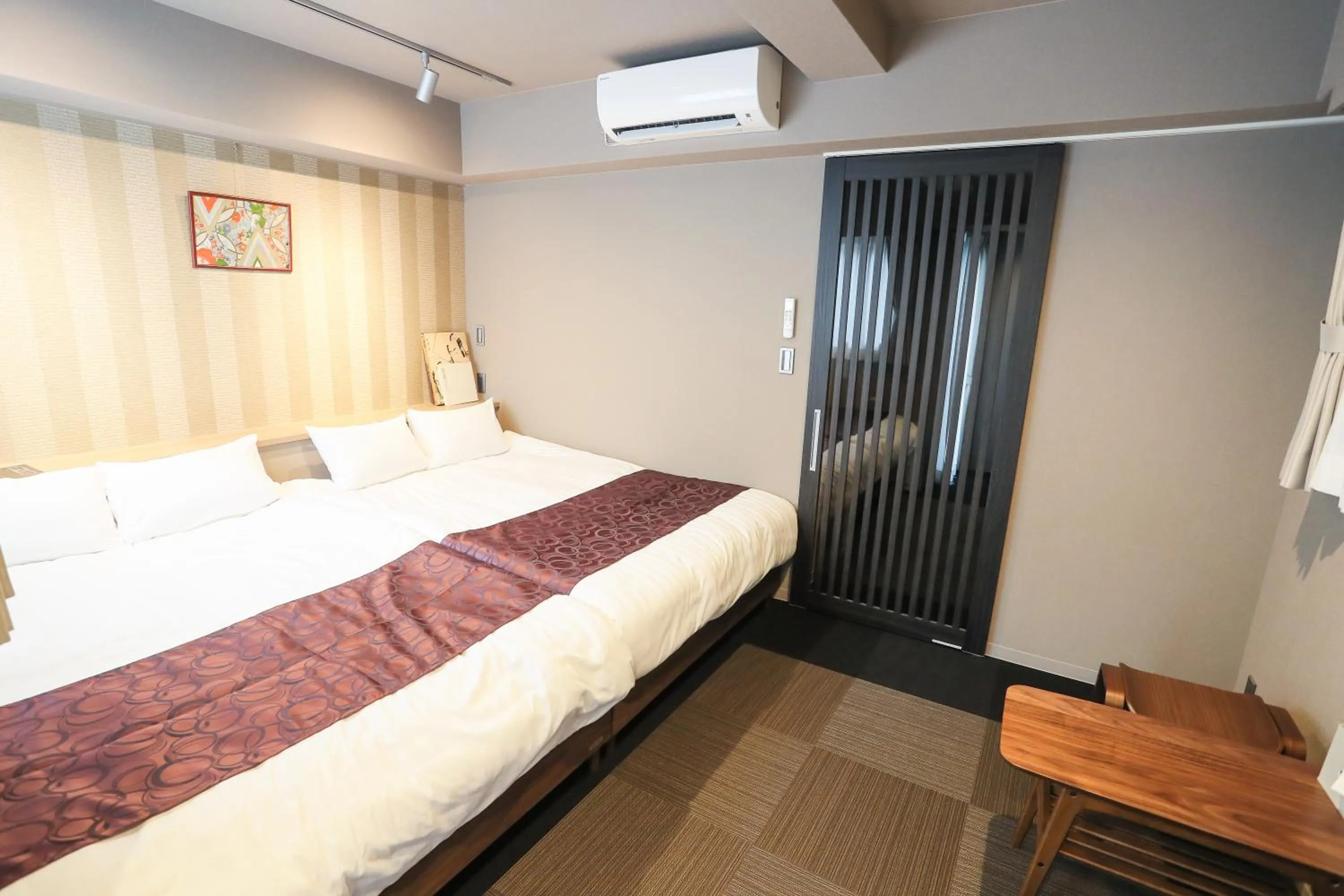 Bed in Apartment Hotel 7key S Kyoto