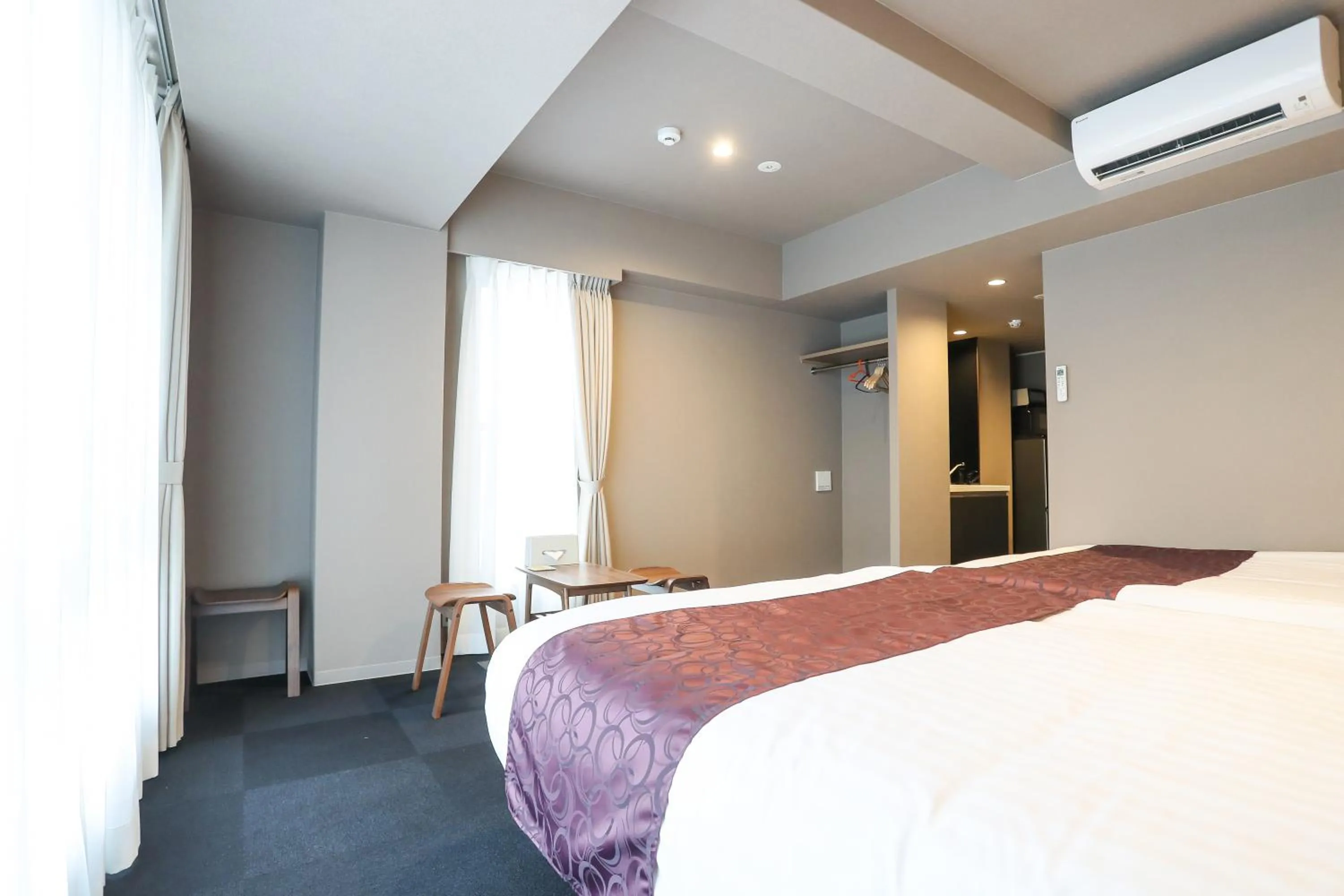 Bed in Apartment Hotel 7key S Kyoto