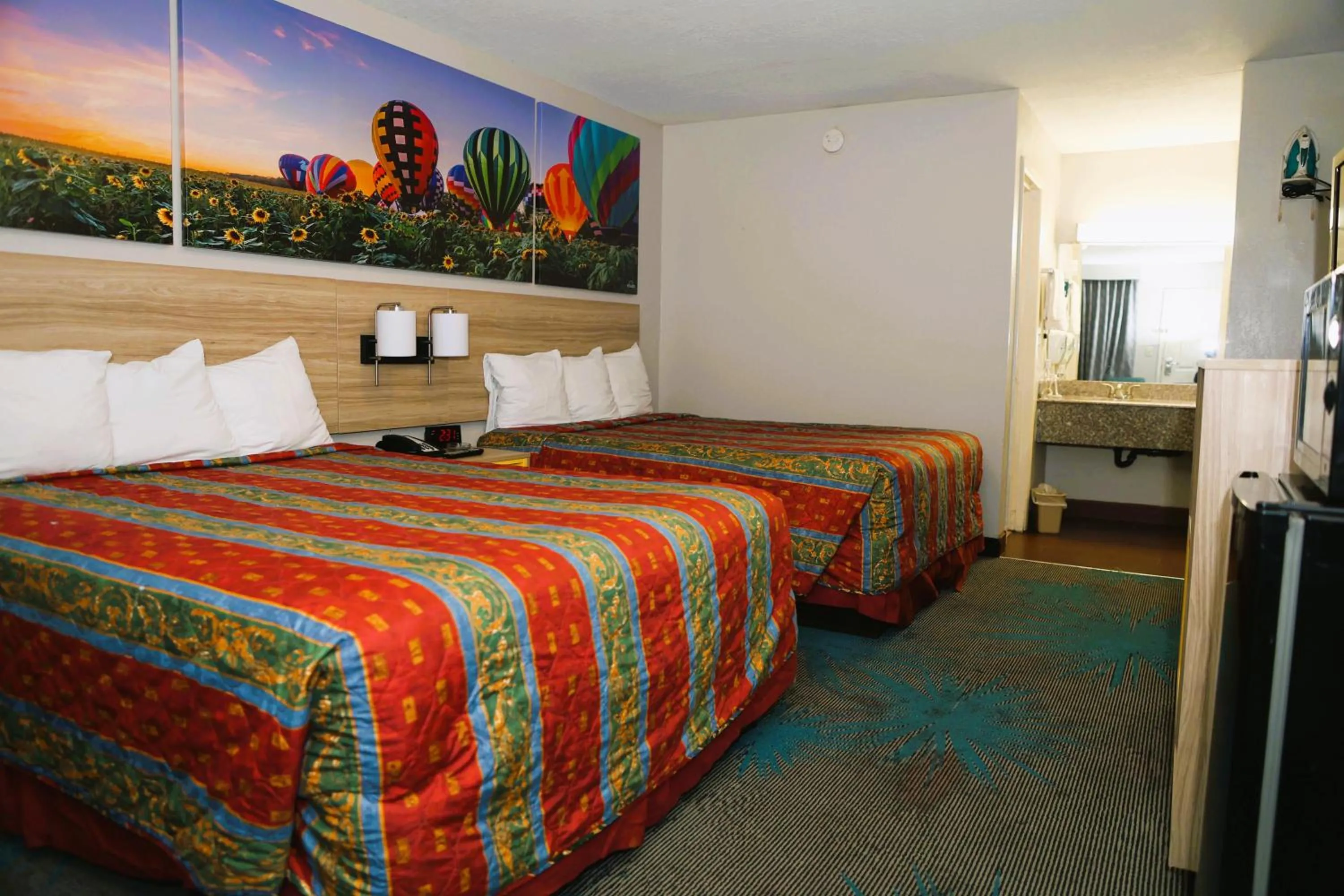 Photo of the whole room, Bed in Days Inn by Wyndham East Albuquerque