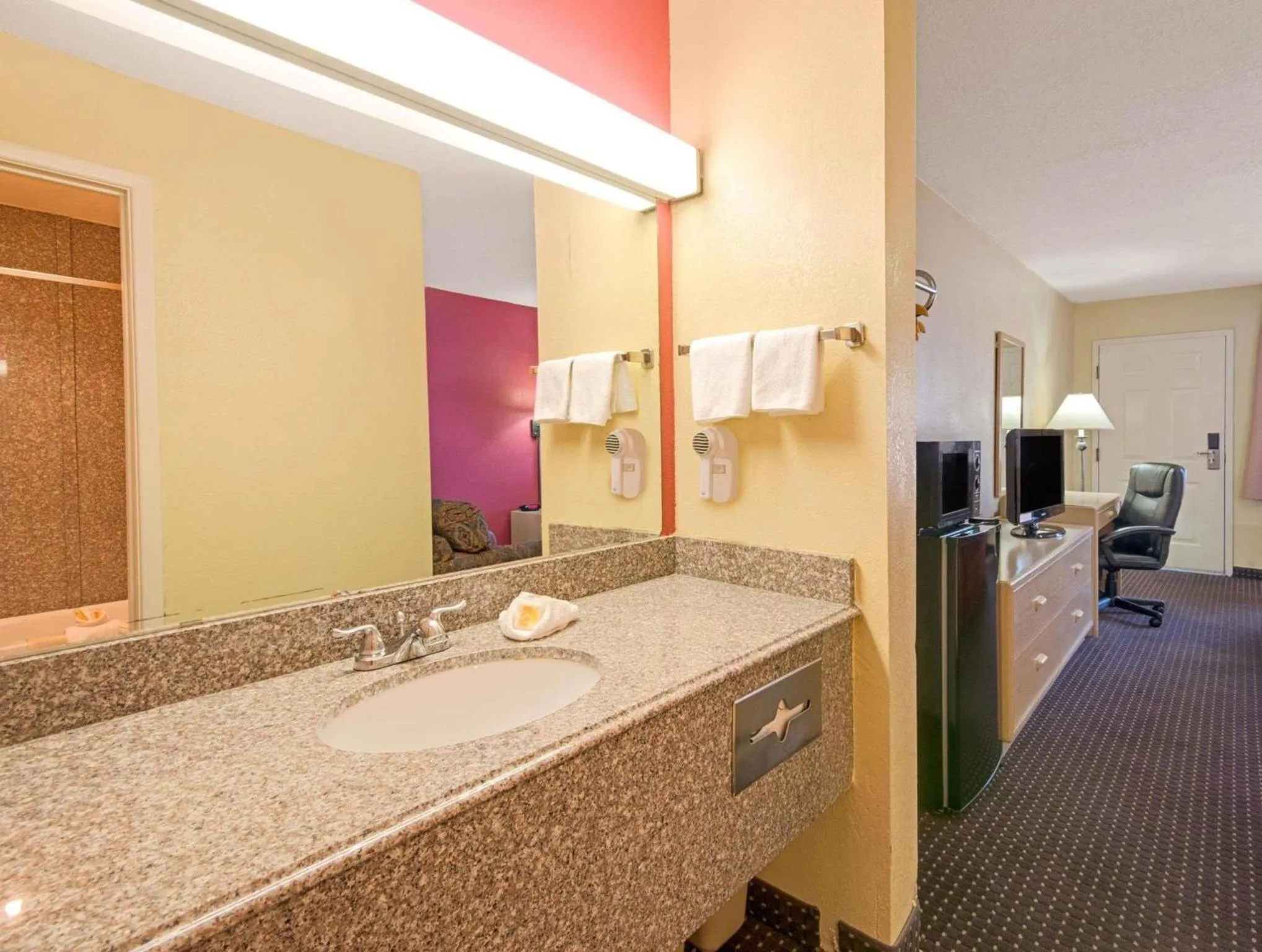 Bathroom in Days Inn by Wyndham East Albuquerque