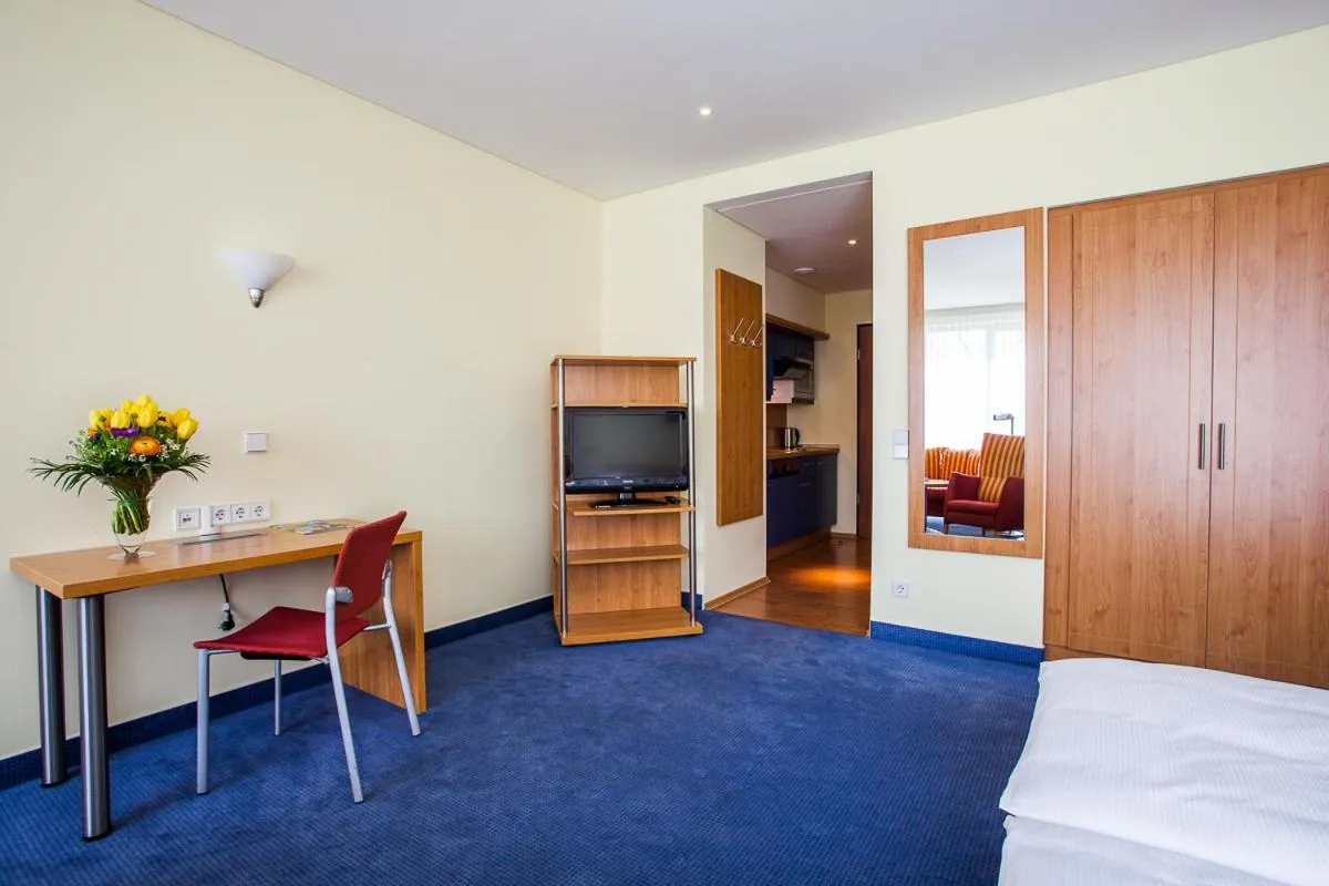 Living room, Bed in Aparion Apartments Berlin