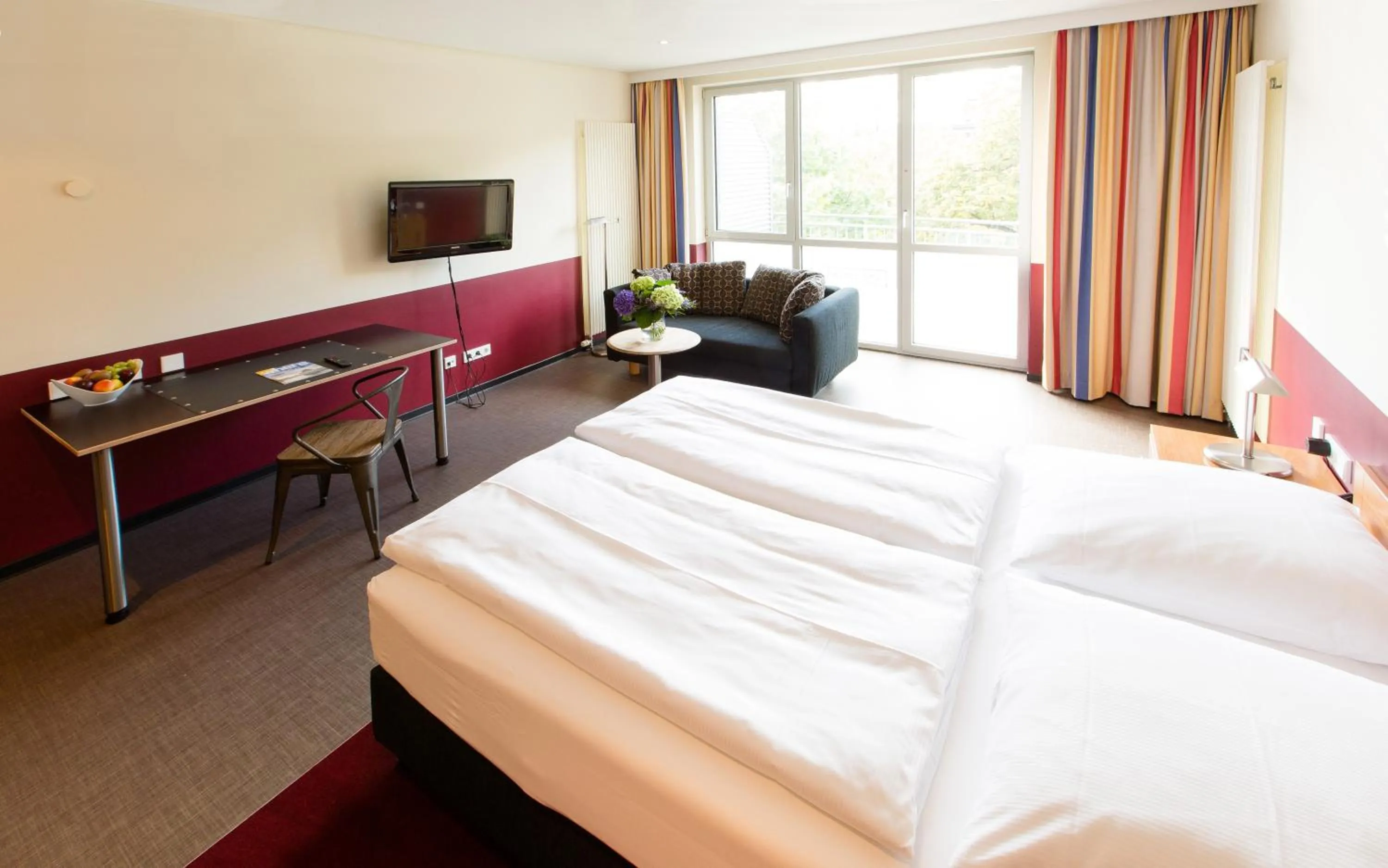 Living room, Bed in Aparion Apartments Berlin