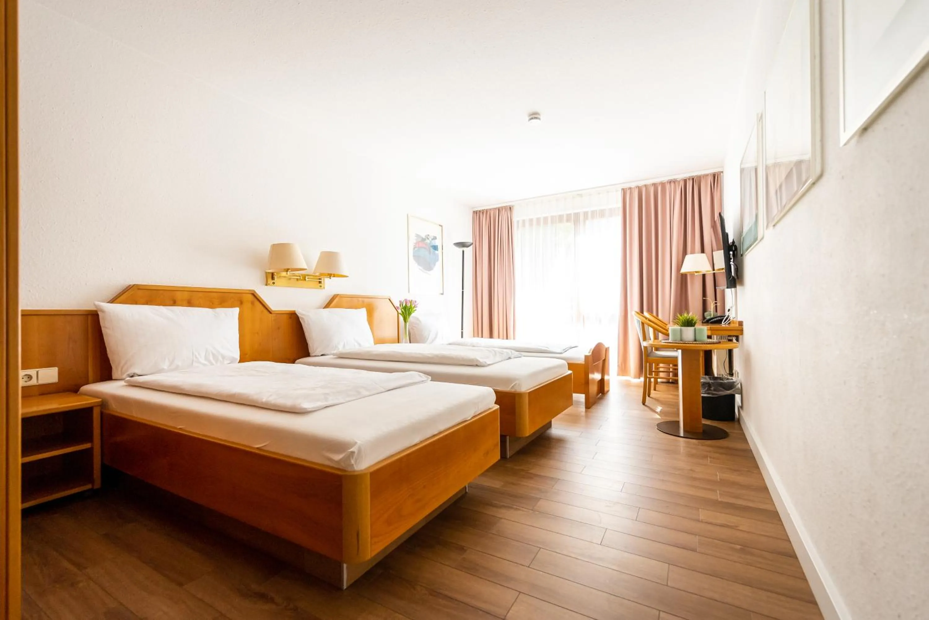 Photo of the whole room, Bed in CityHotel Feuerbach