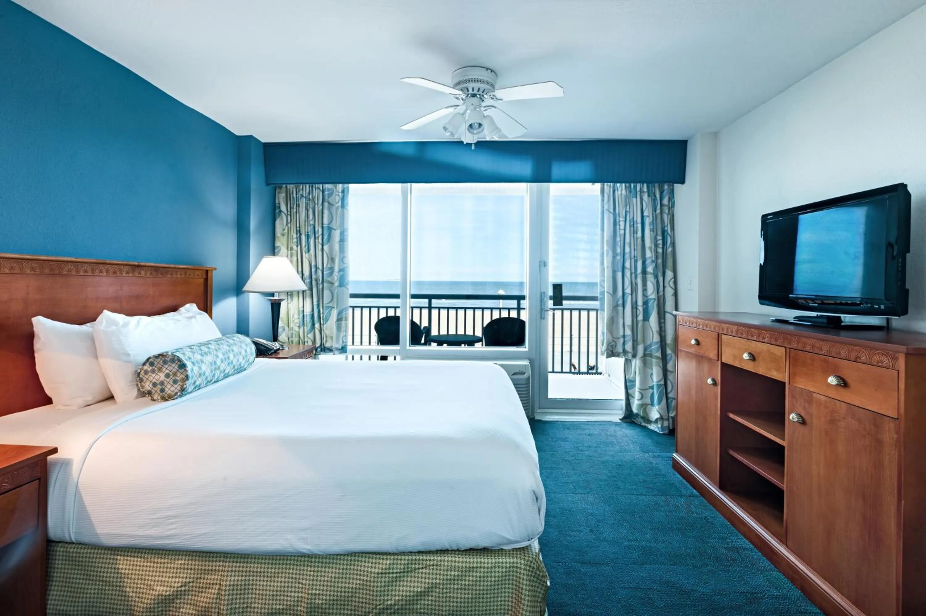Balcony/Terrace, Bed in Ocean Sands Resort, Oceanfront, Virginia Beach by Vacatia