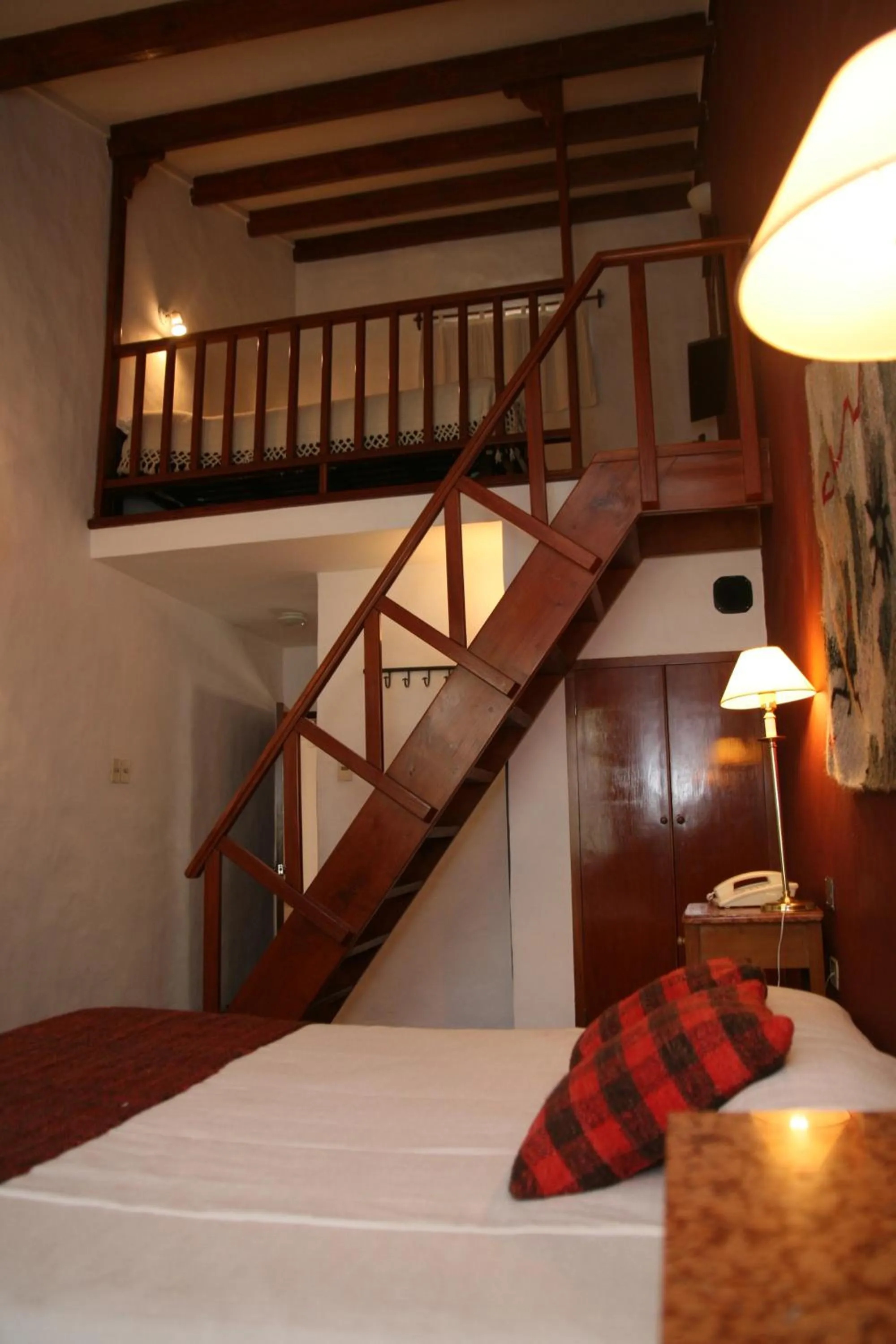 Photo of the whole room, Bed in Hostería Lunahuana