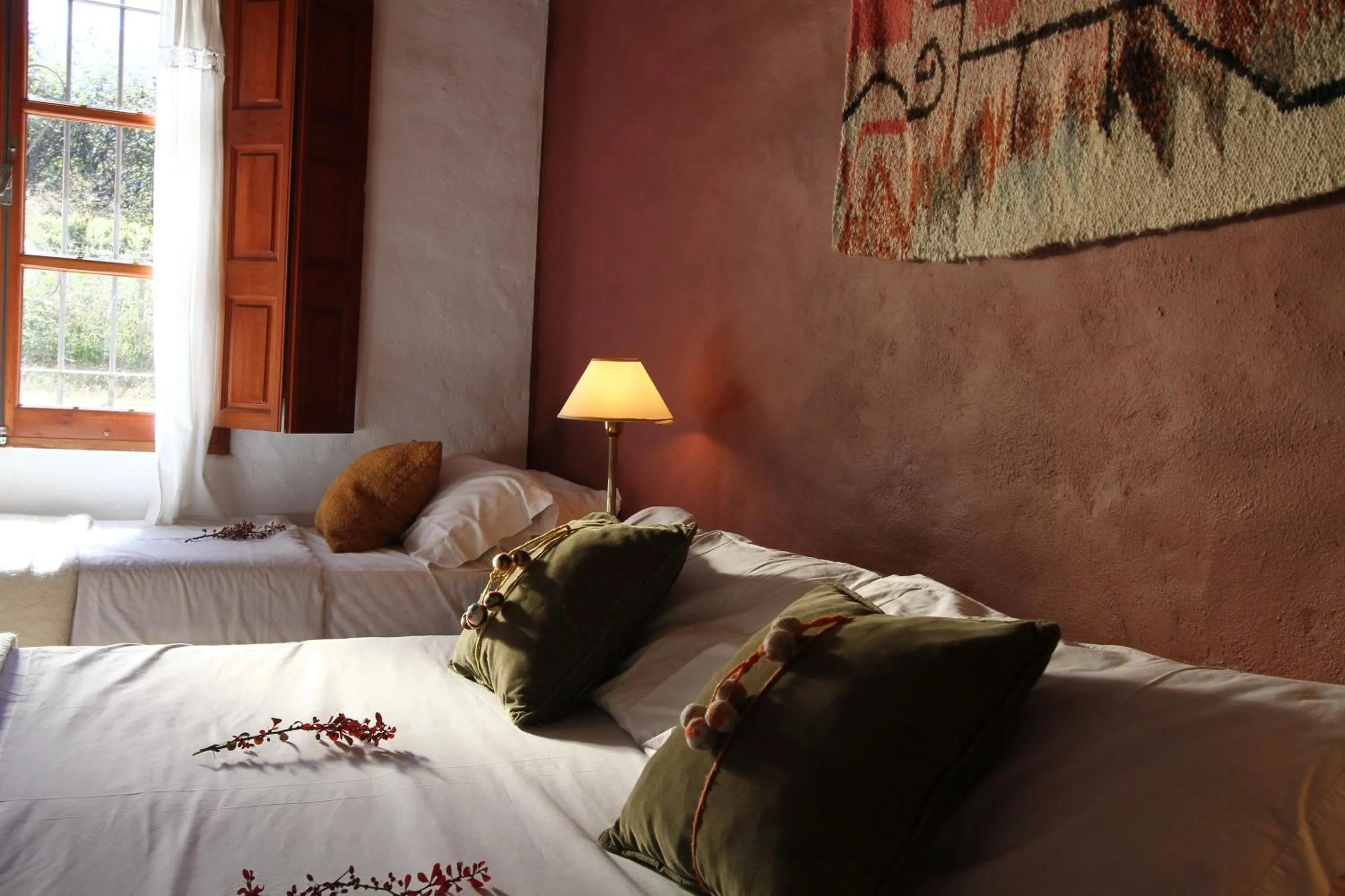 Photo of the whole room, Bed in Hostería Lunahuana