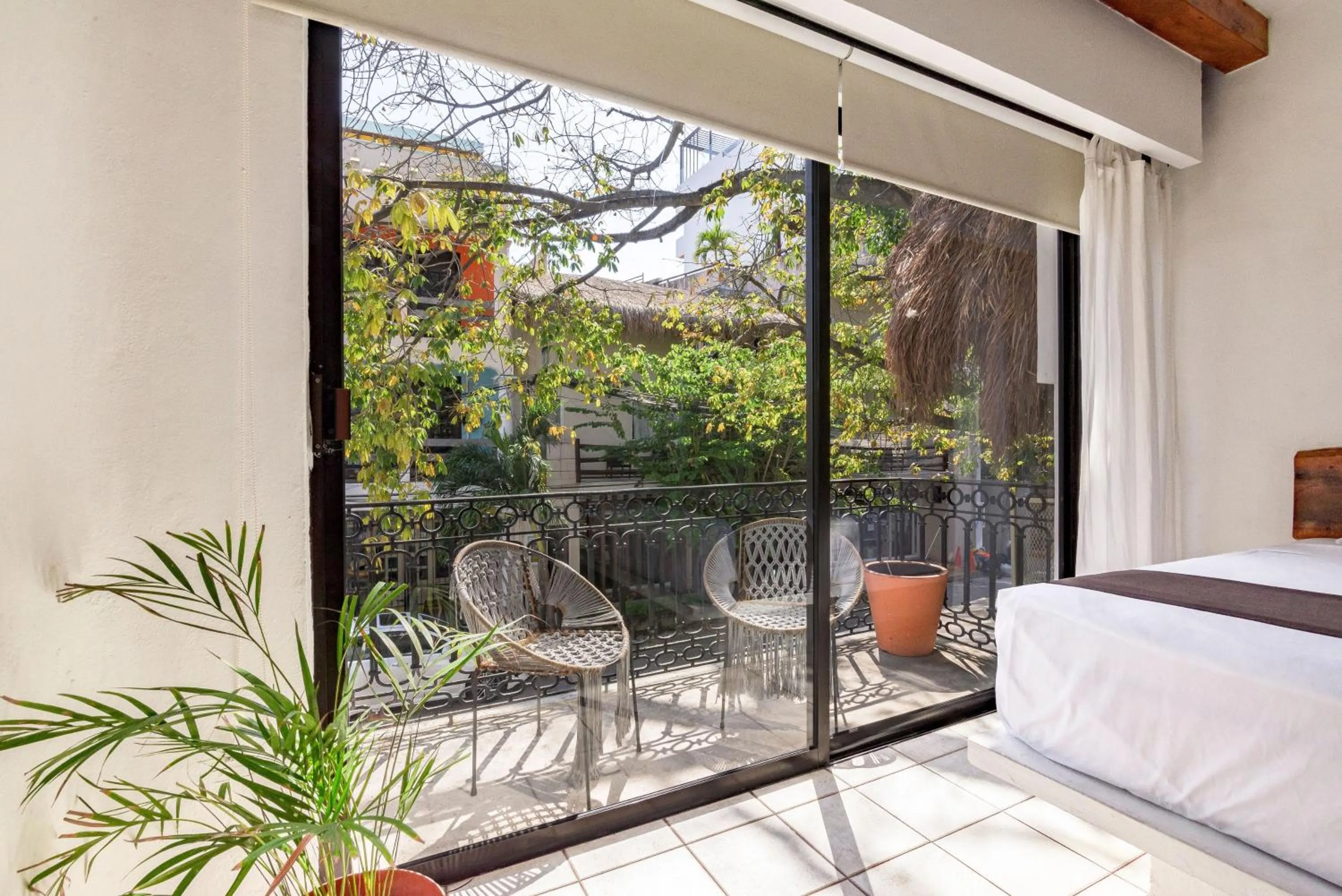 Balcony/Terrace, Bed in Hotel Banana Boutique & Spa - 5th Av Playa del Carmen