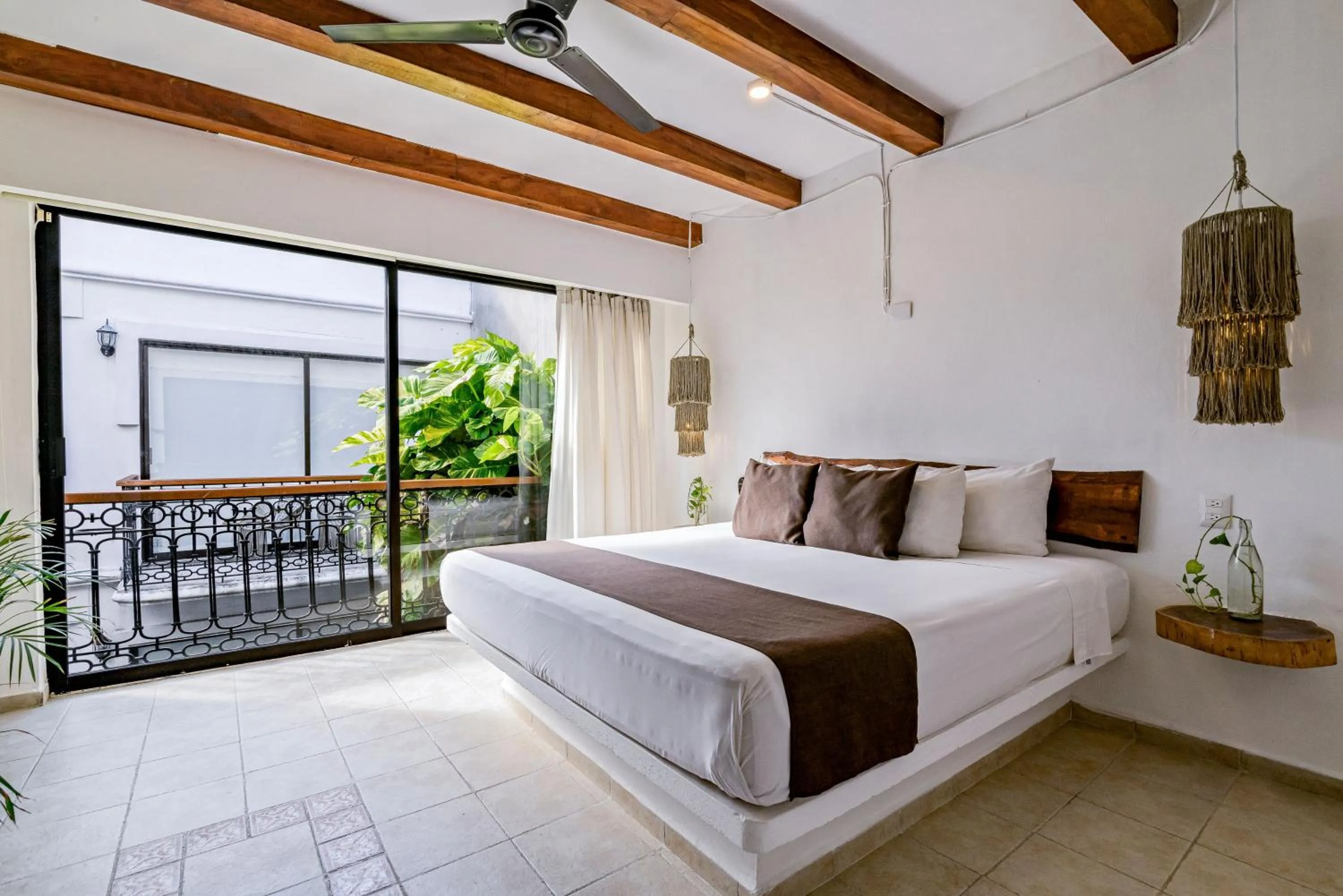 Balcony/Terrace, Bed in Hotel Banana Boutique & Spa - 5th Av Playa del Carmen