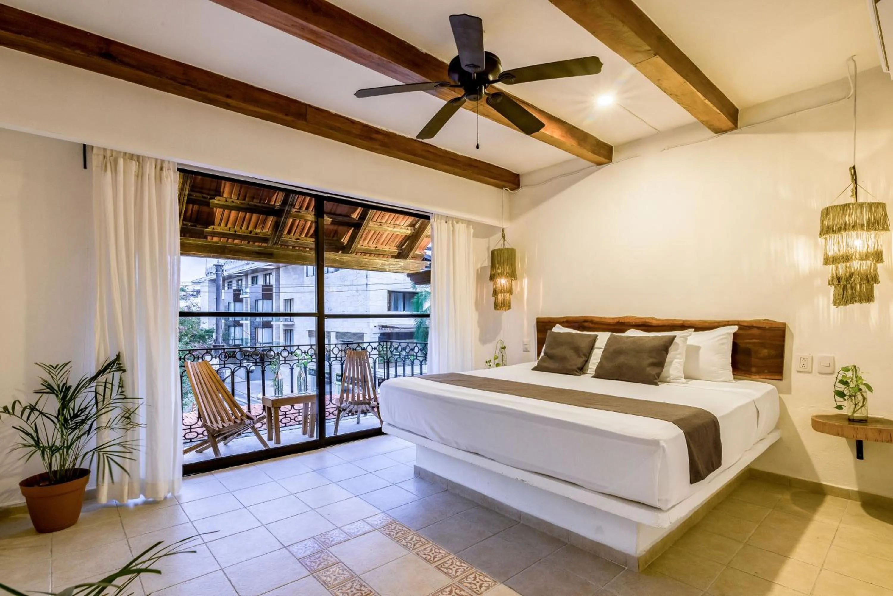 Photo of the whole room, Bed in Hotel Banana Boutique & Spa - 5th Av Playa del Carmen
