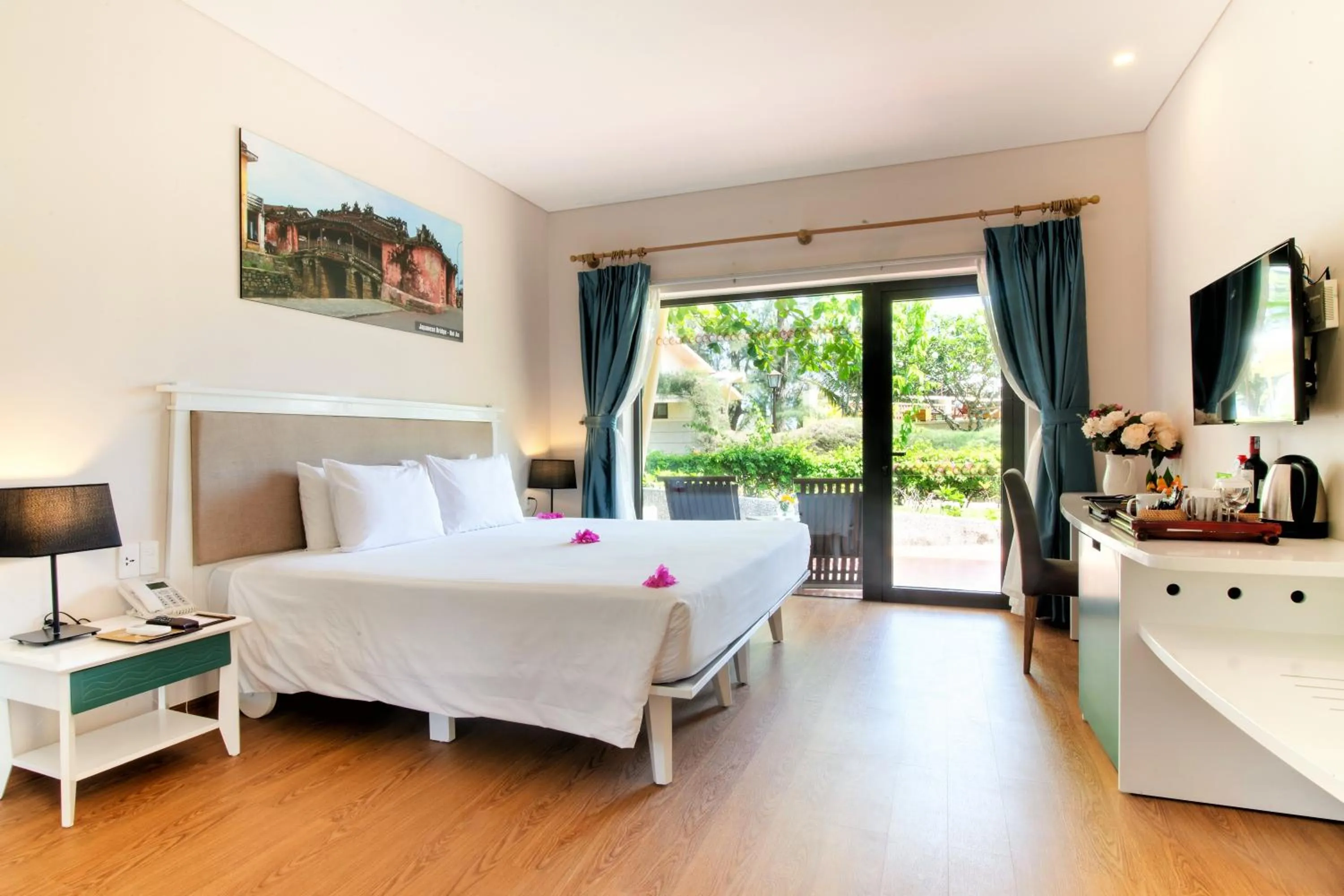 Patio, Bed in Sandy Beach Non Nuoc Resort