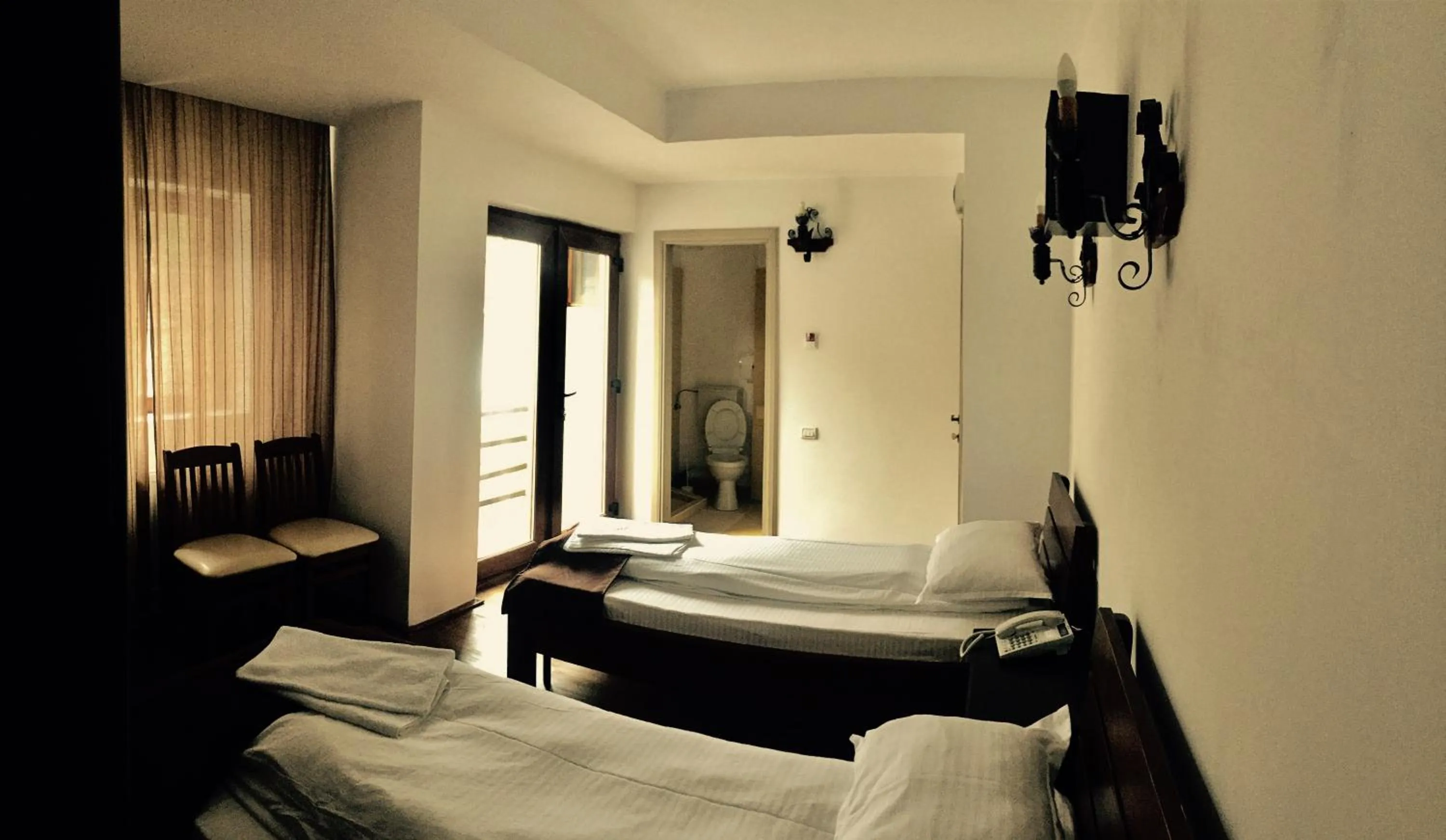 Bed in Hotel Casa Vlahilor