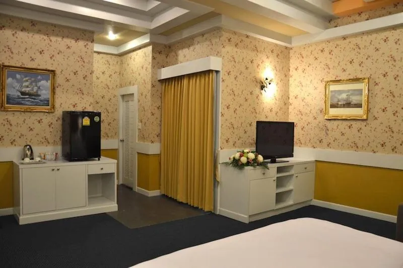 Bed in Raya Grand Hotel