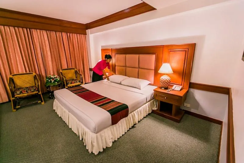 Bed in Raya Grand Hotel