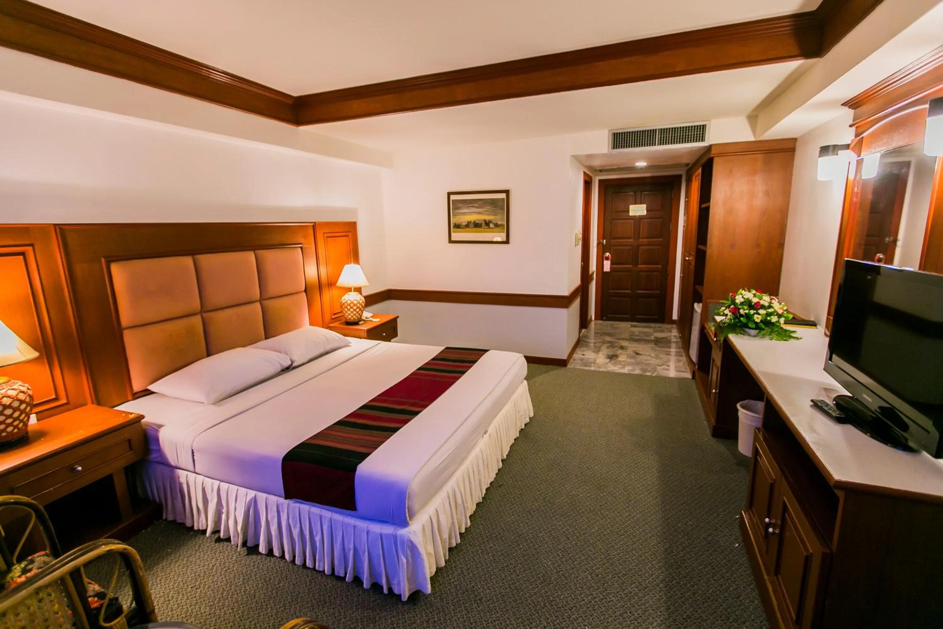 Bed in Raya Grand Hotel