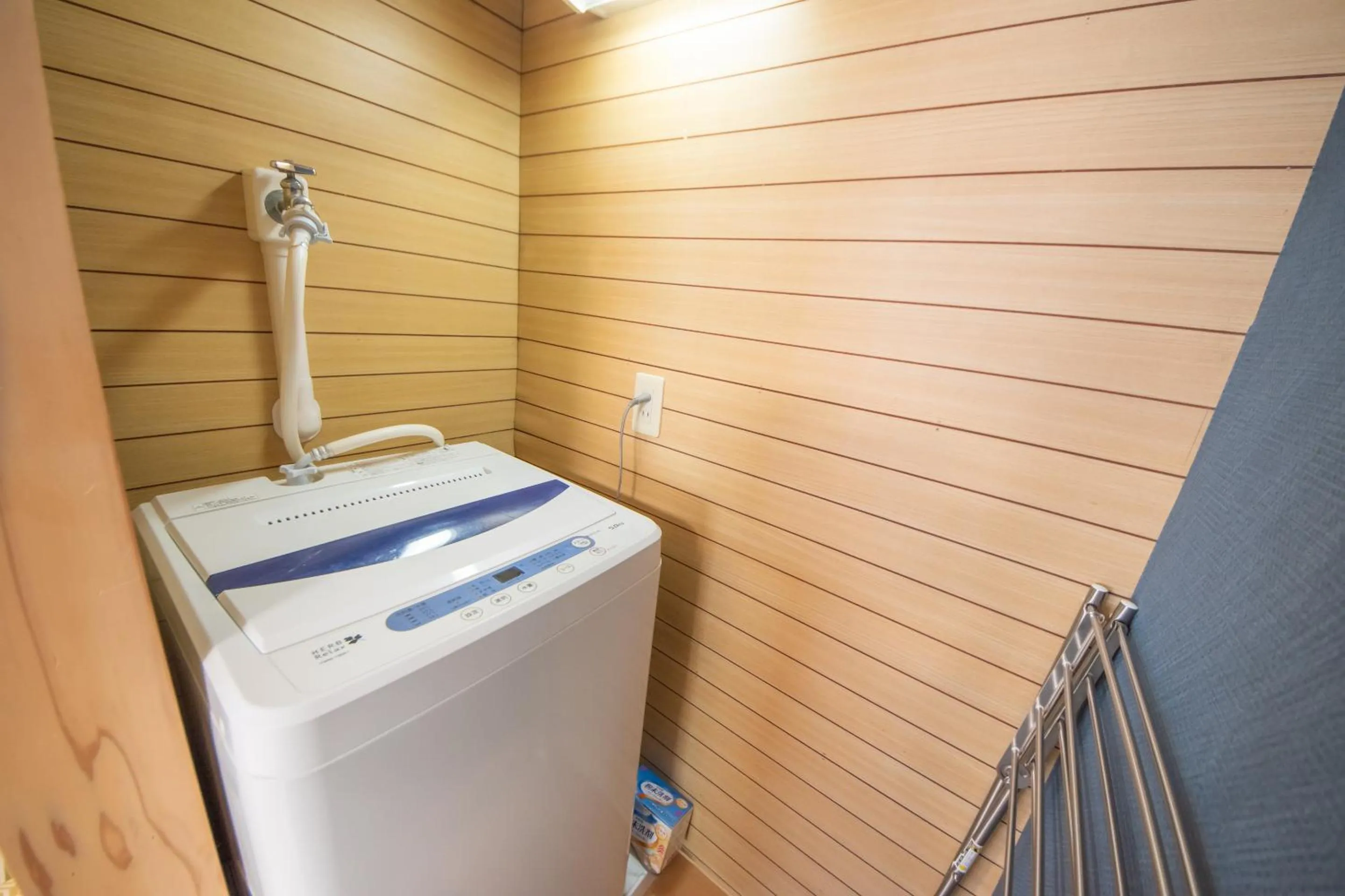 washing machine in Comfy Stay MR1 & MR2