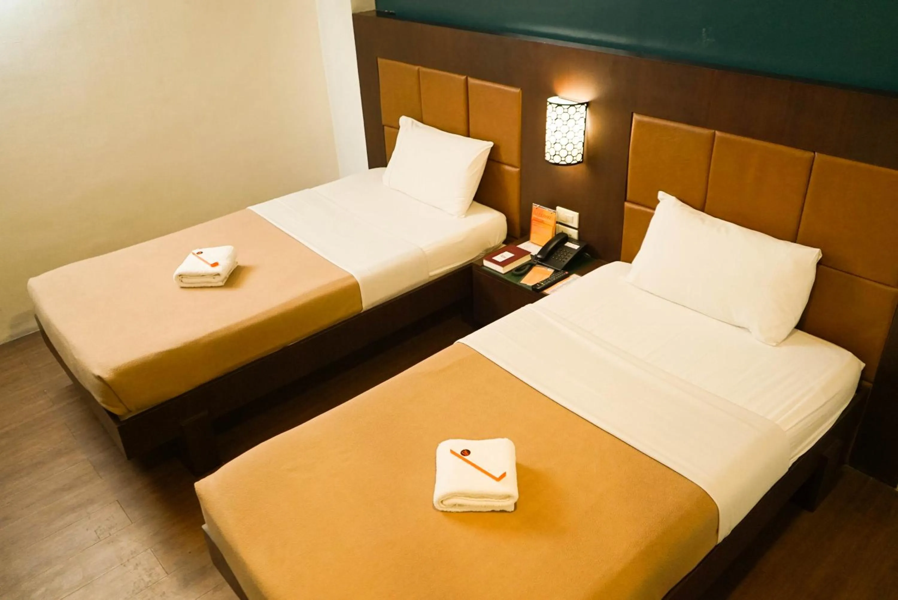 Bed in Tacloban Plaza Hotel