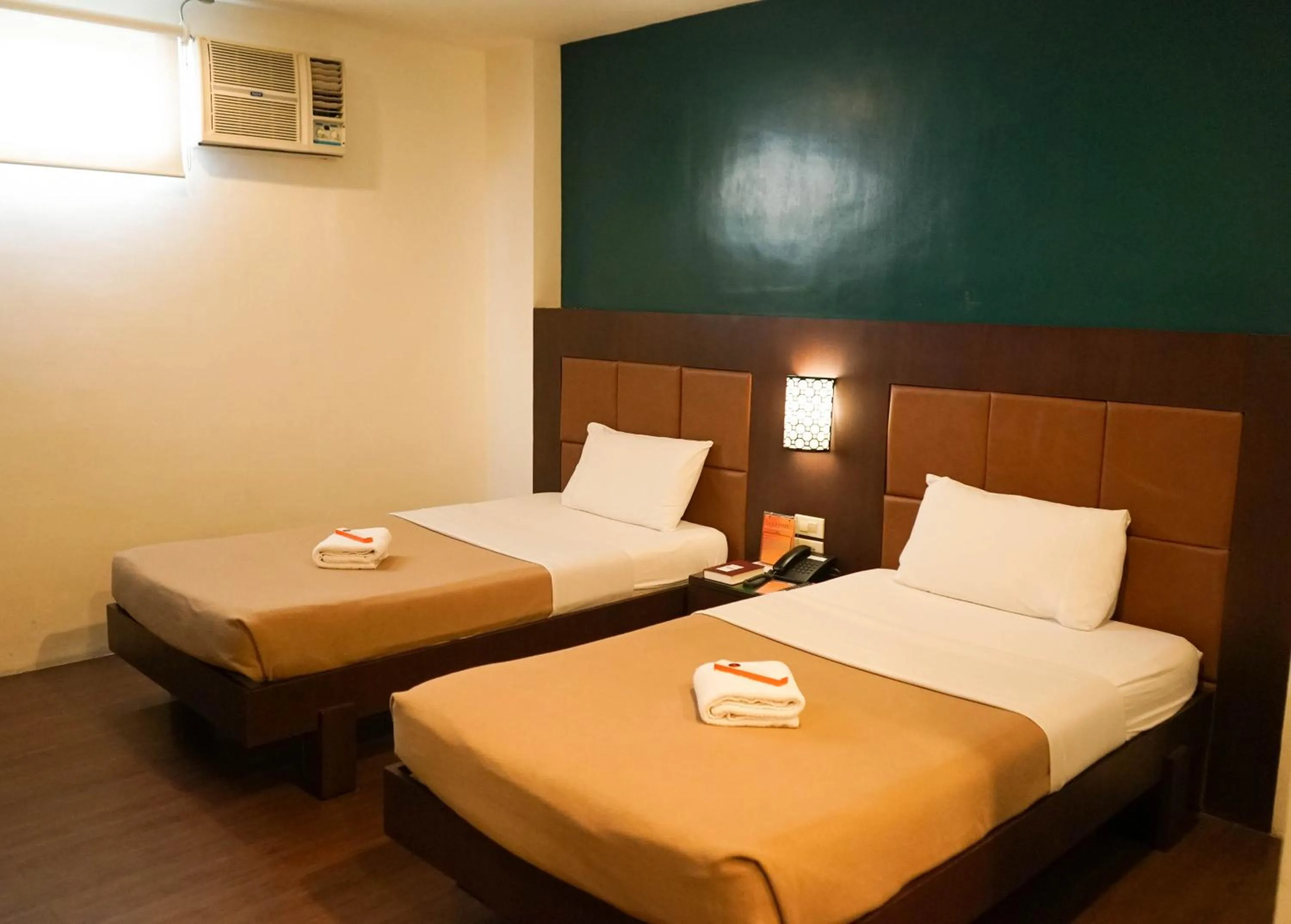 Bed in Tacloban Plaza Hotel