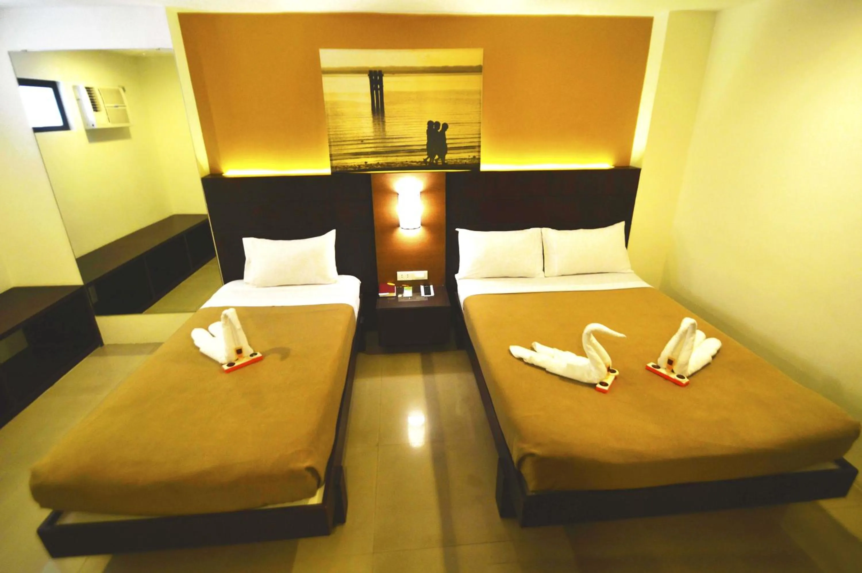 Bed in Tacloban Plaza Hotel