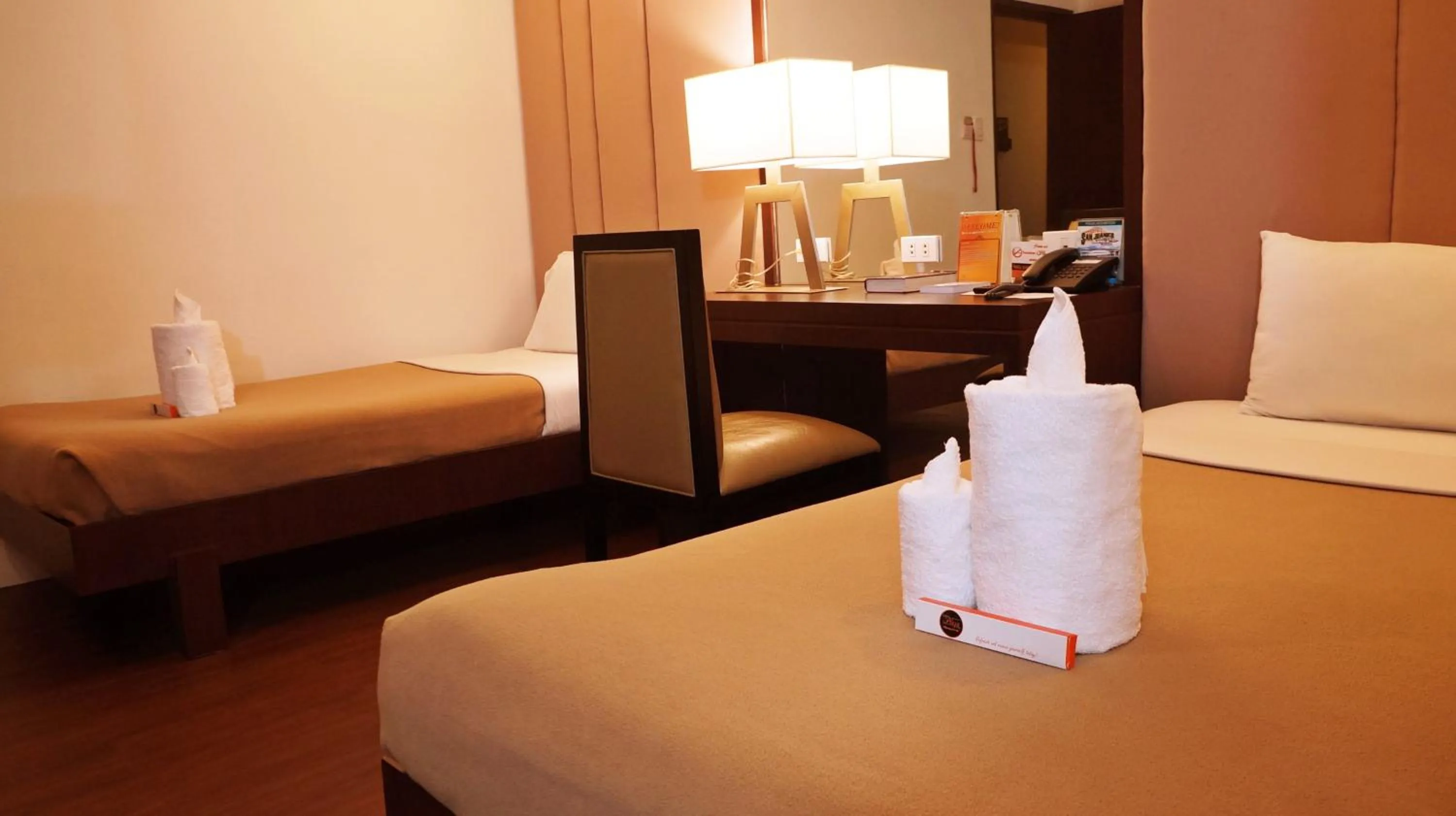 Bed in Tacloban Plaza Hotel