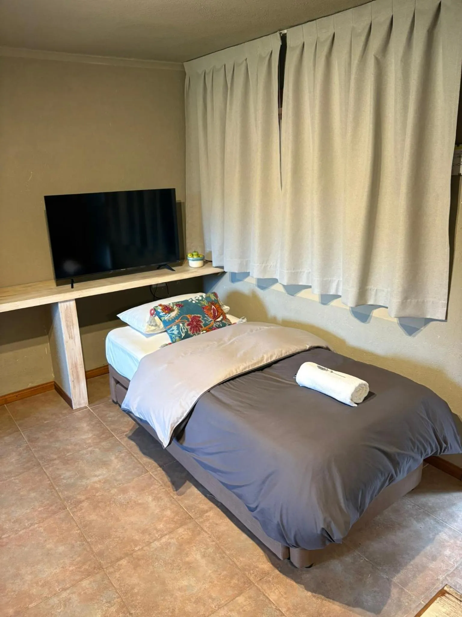 Bed in Le Bouquet Apart Hotel