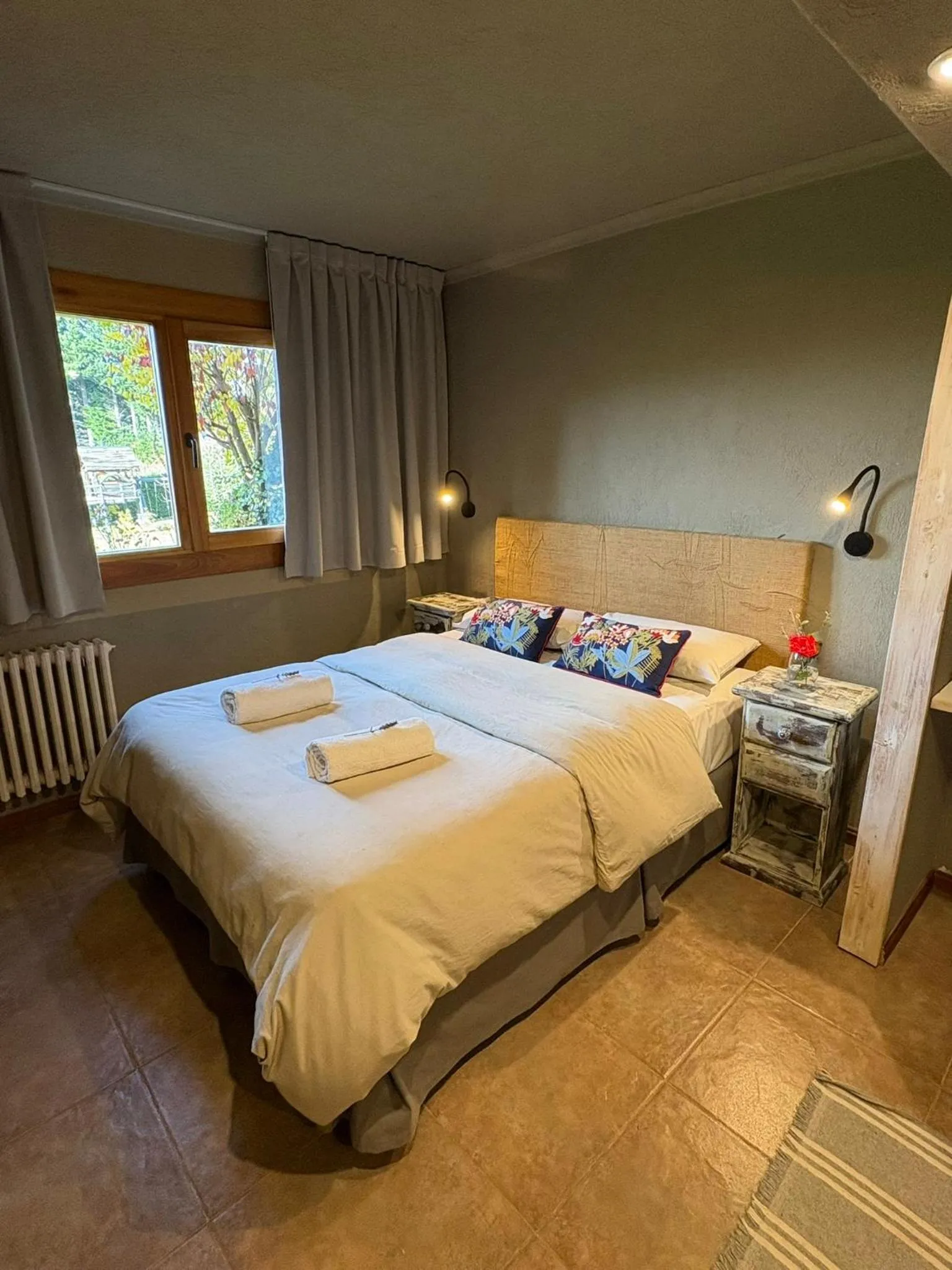 Bed in Le Bouquet Apart Hotel