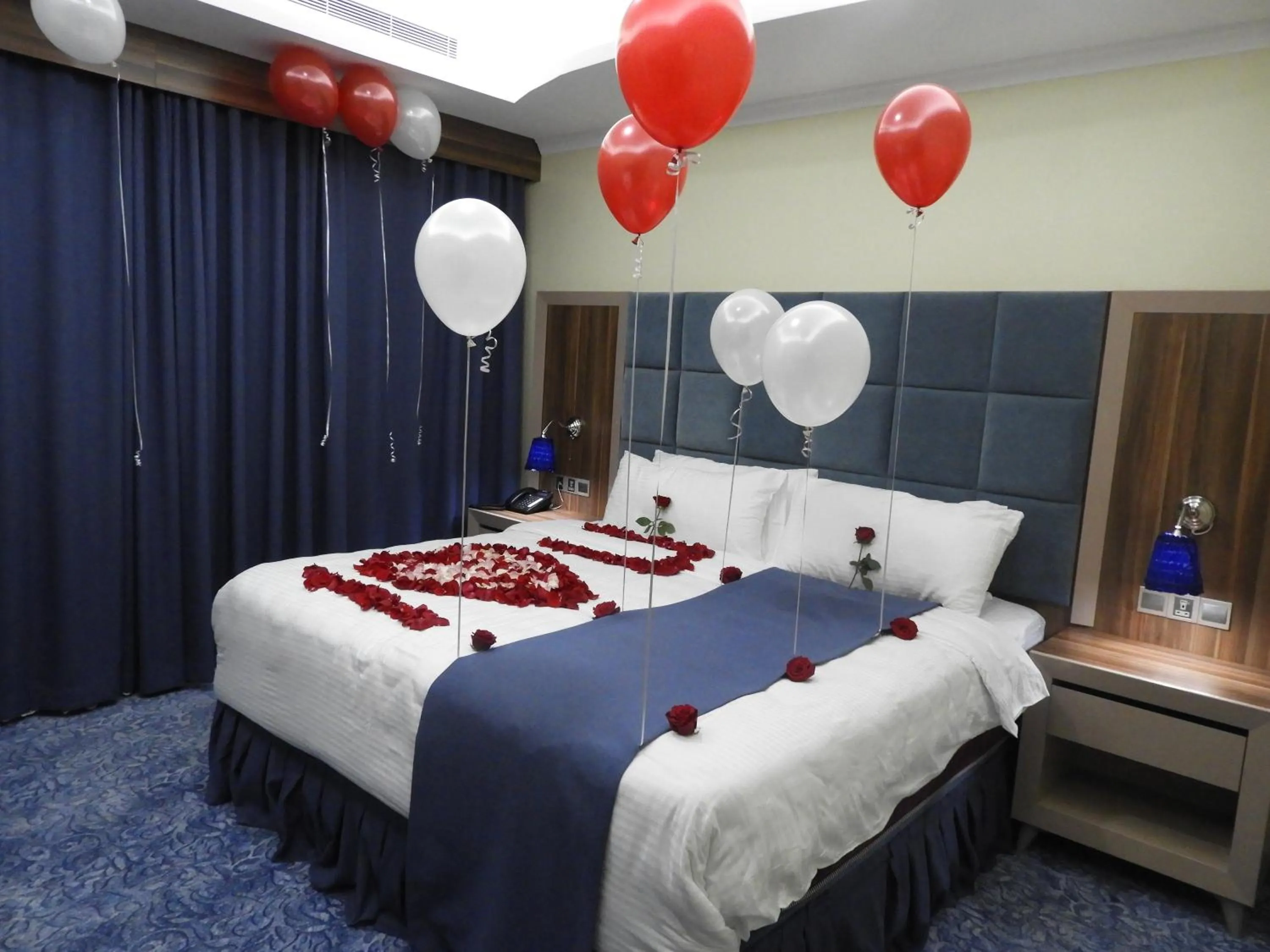 Bed in Swiss Blue serviced Apartments- Al Zahra