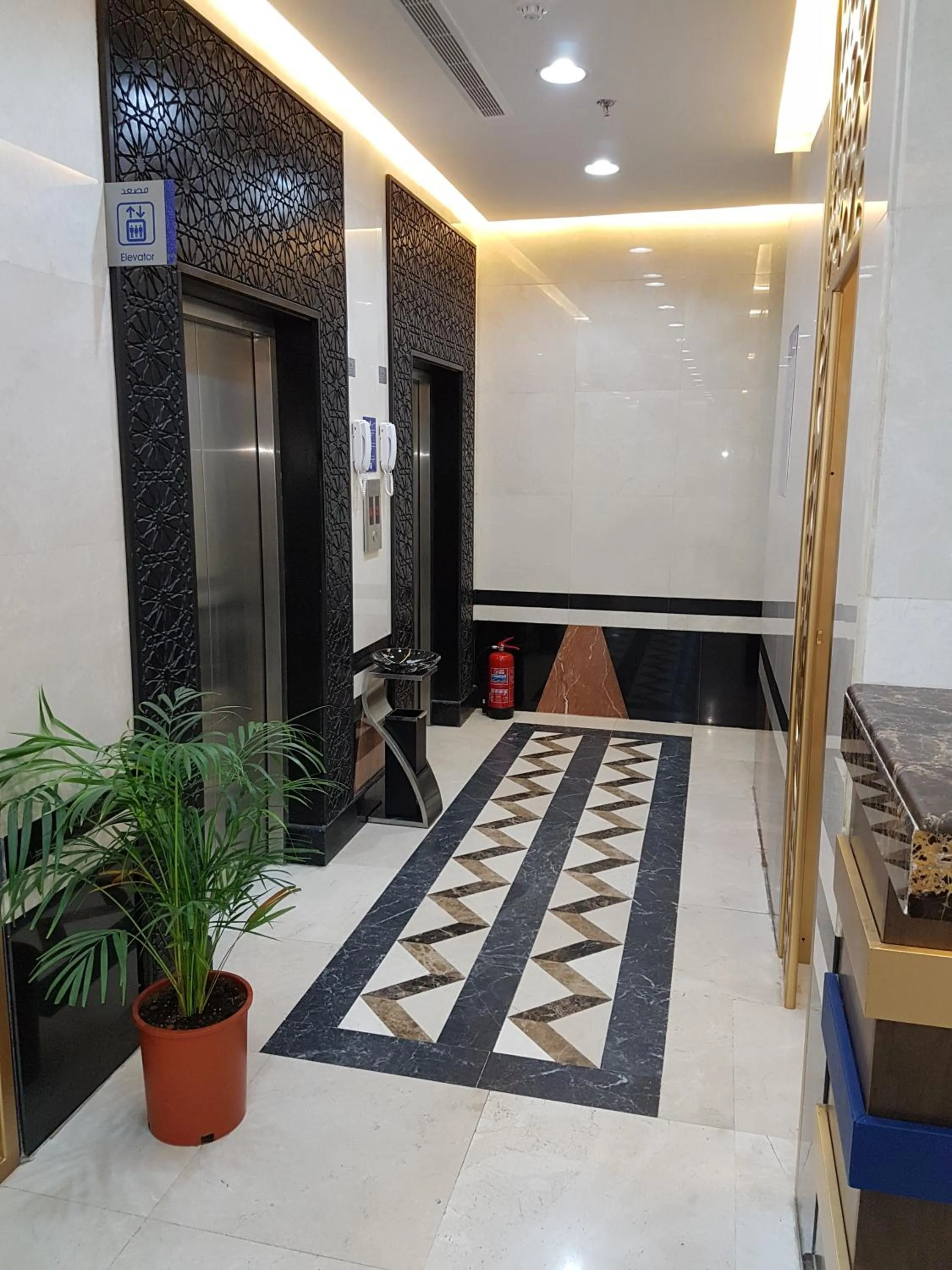 Property building in Swiss Blue serviced Apartments- Al Zahra