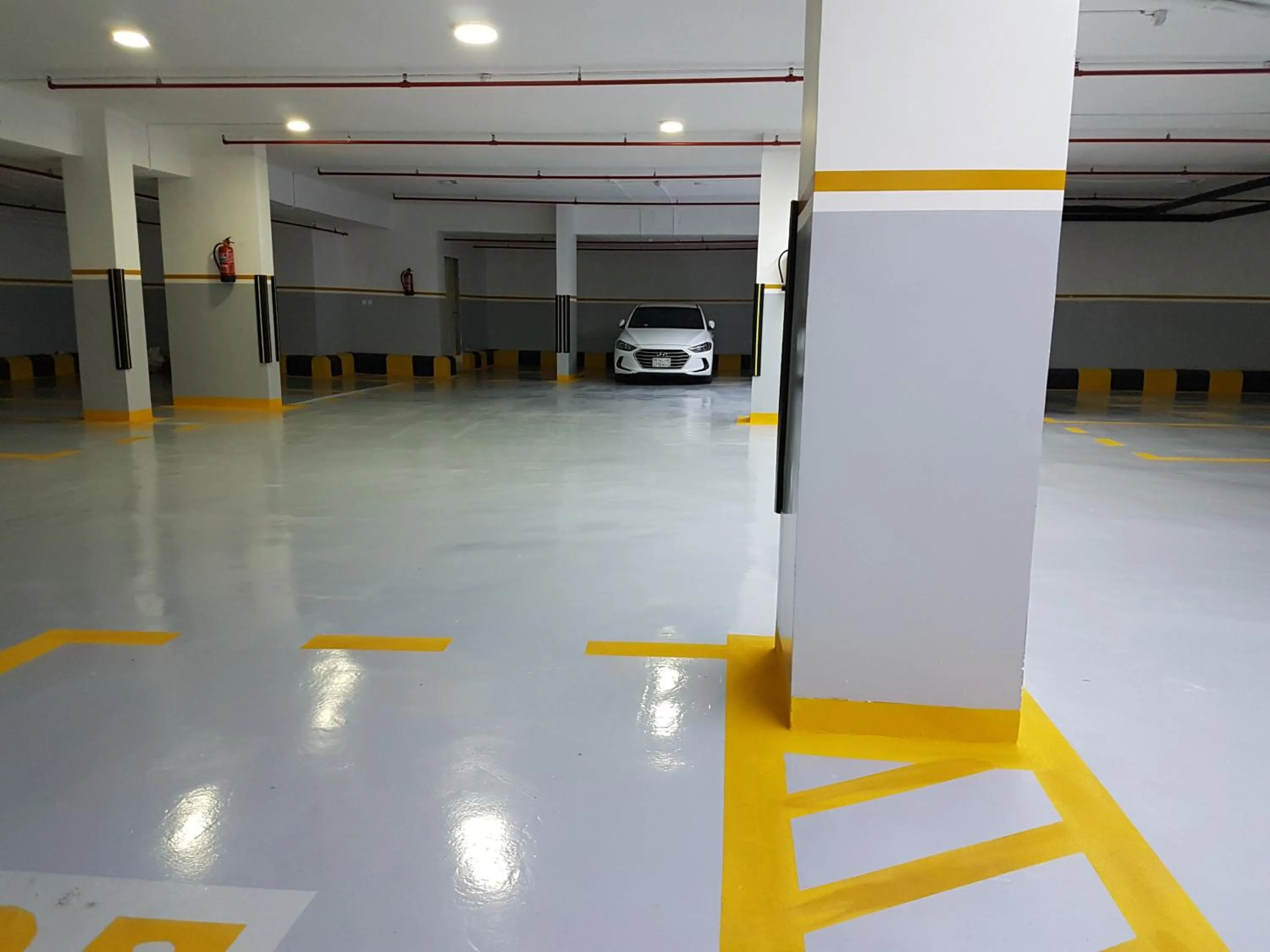 Property building in Swiss Blue serviced Apartments- Al Zahra