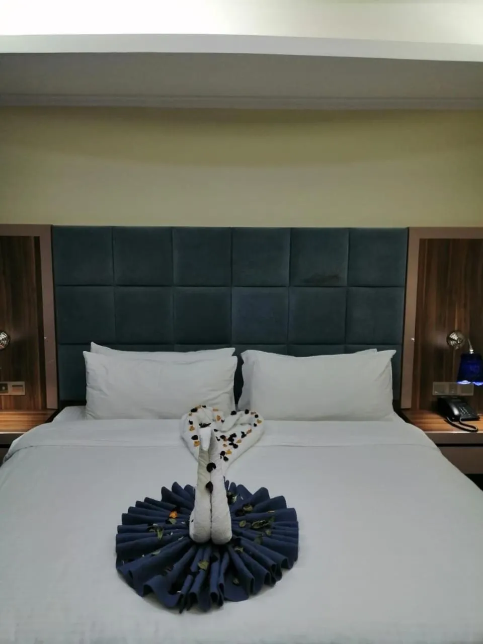 Bed in Swiss Blue serviced Apartments- Al Zahra