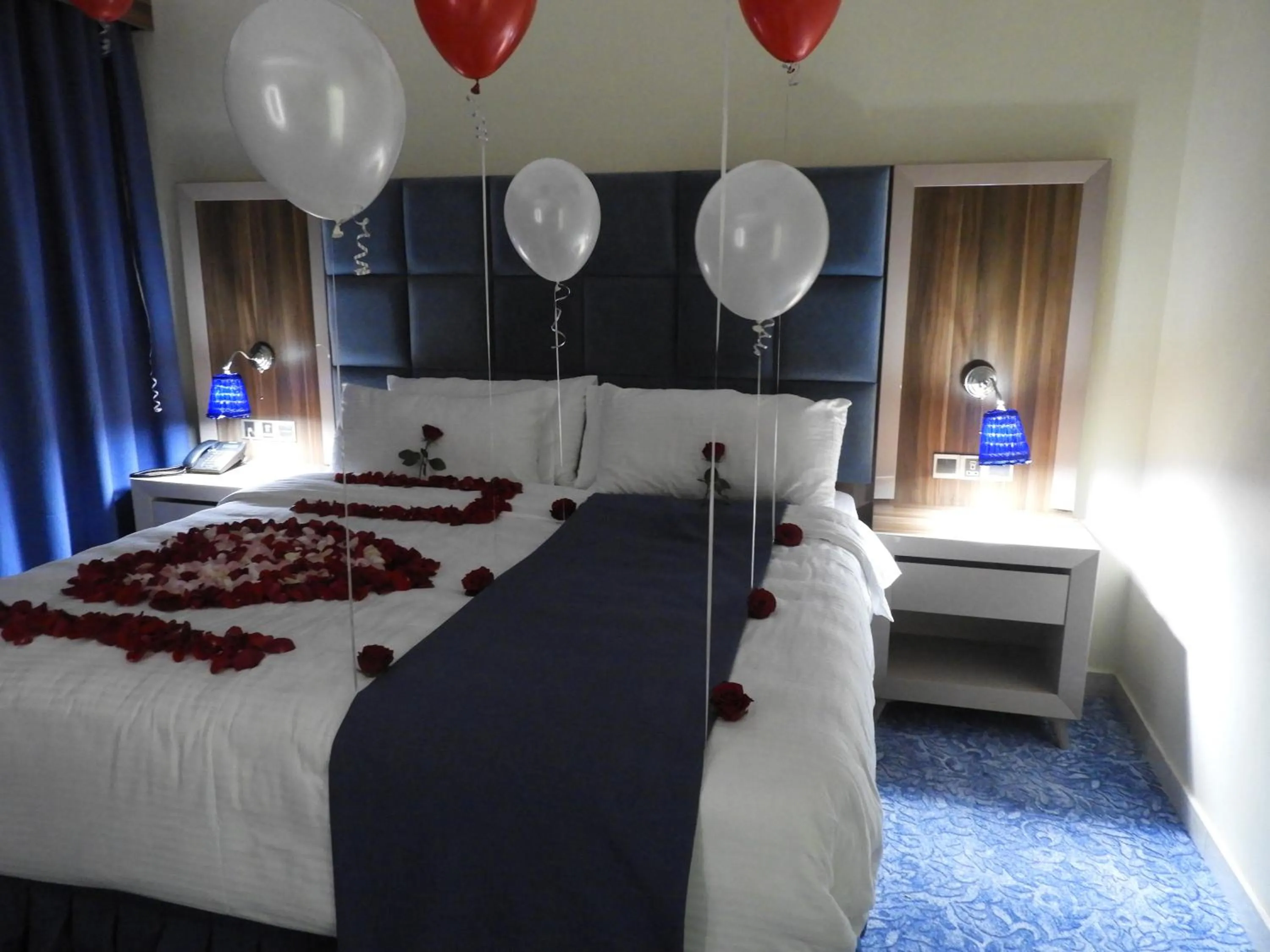 Bed in Swiss Blue serviced Apartments- Al Zahra