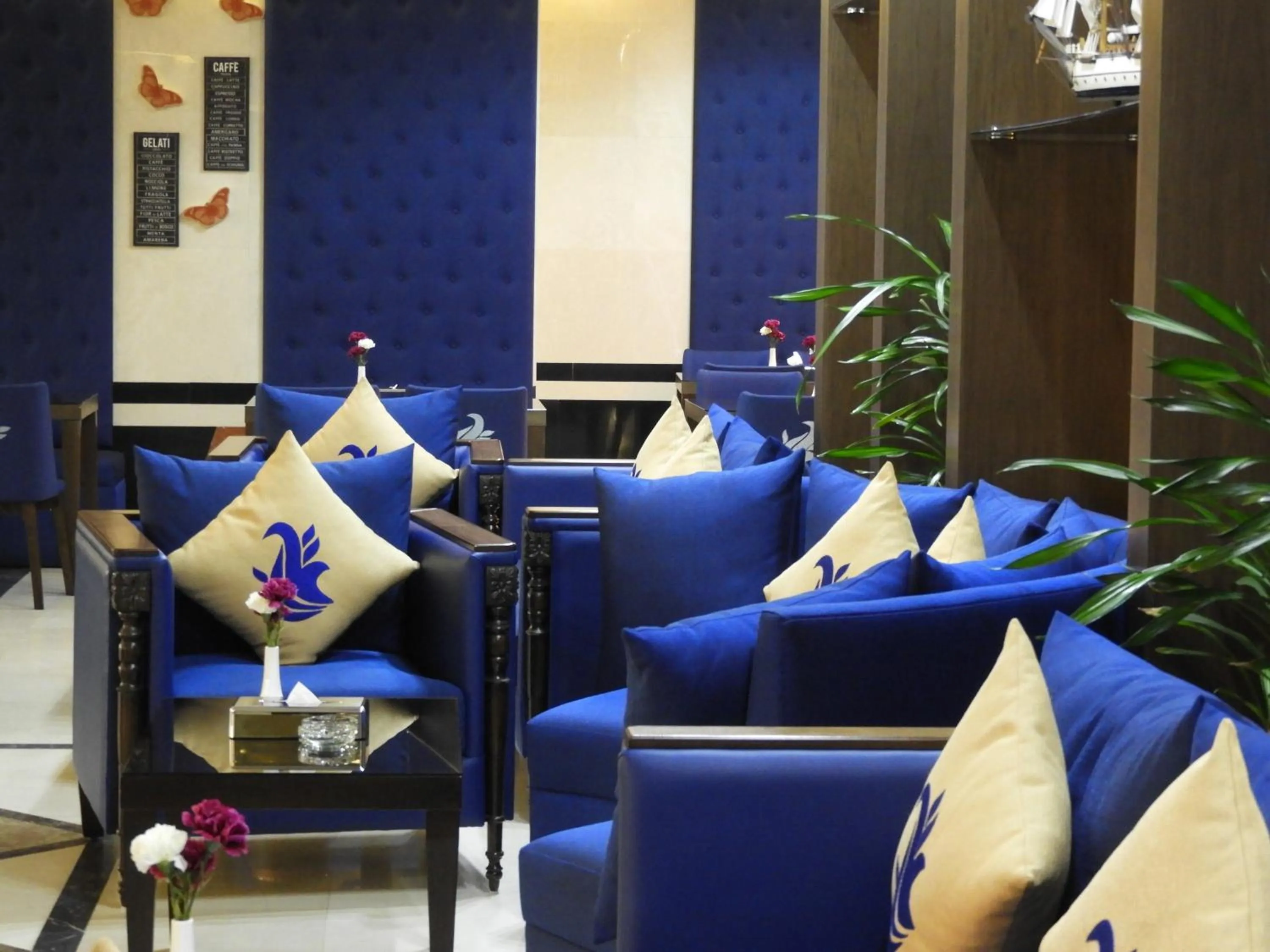 Seating area in Swiss Blue serviced Apartments- Al Zahra