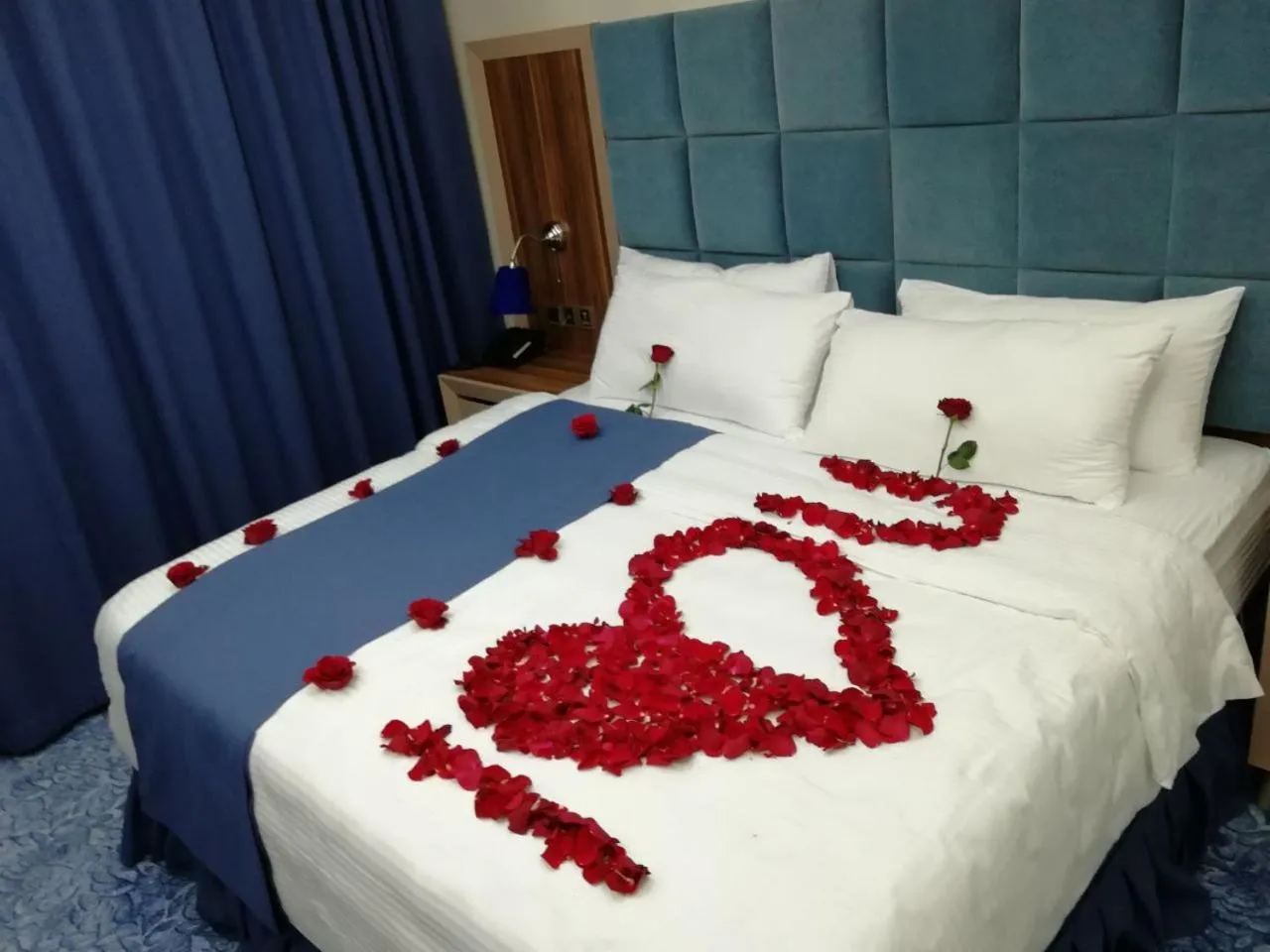 Bed in Swiss Blue serviced Apartments- Al Zahra