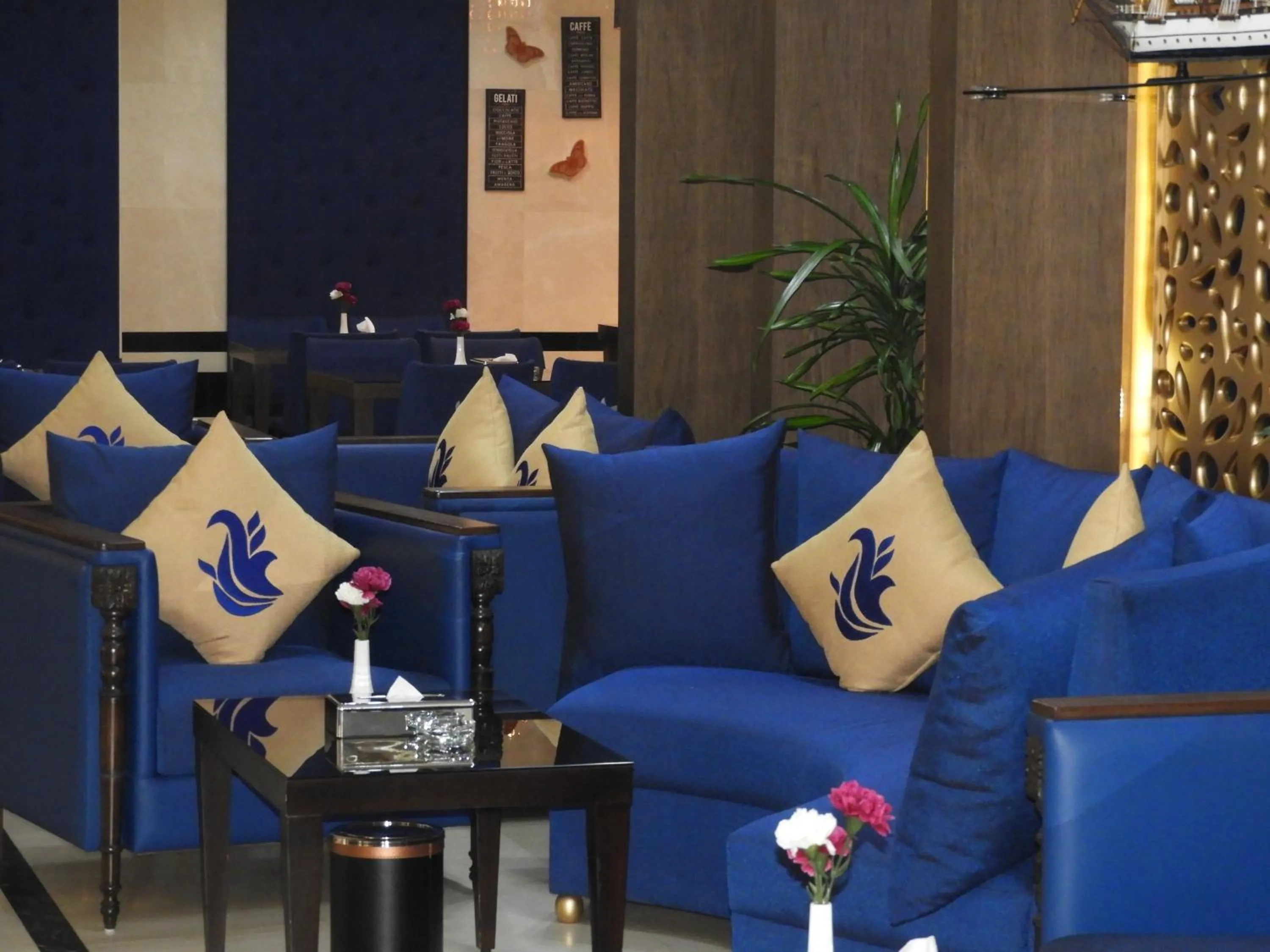 Seating area in Swiss Blue serviced Apartments- Al Zahra