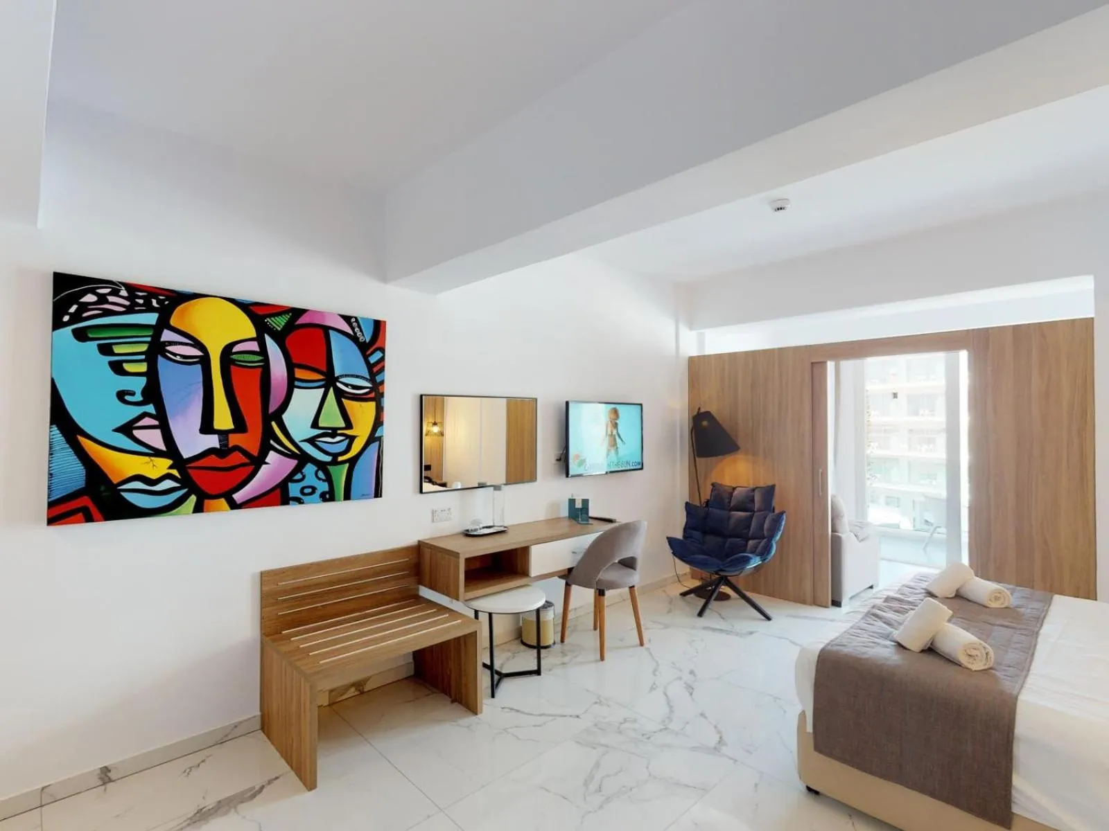 Bedroom in The Blue Ivy Hotel & Suites